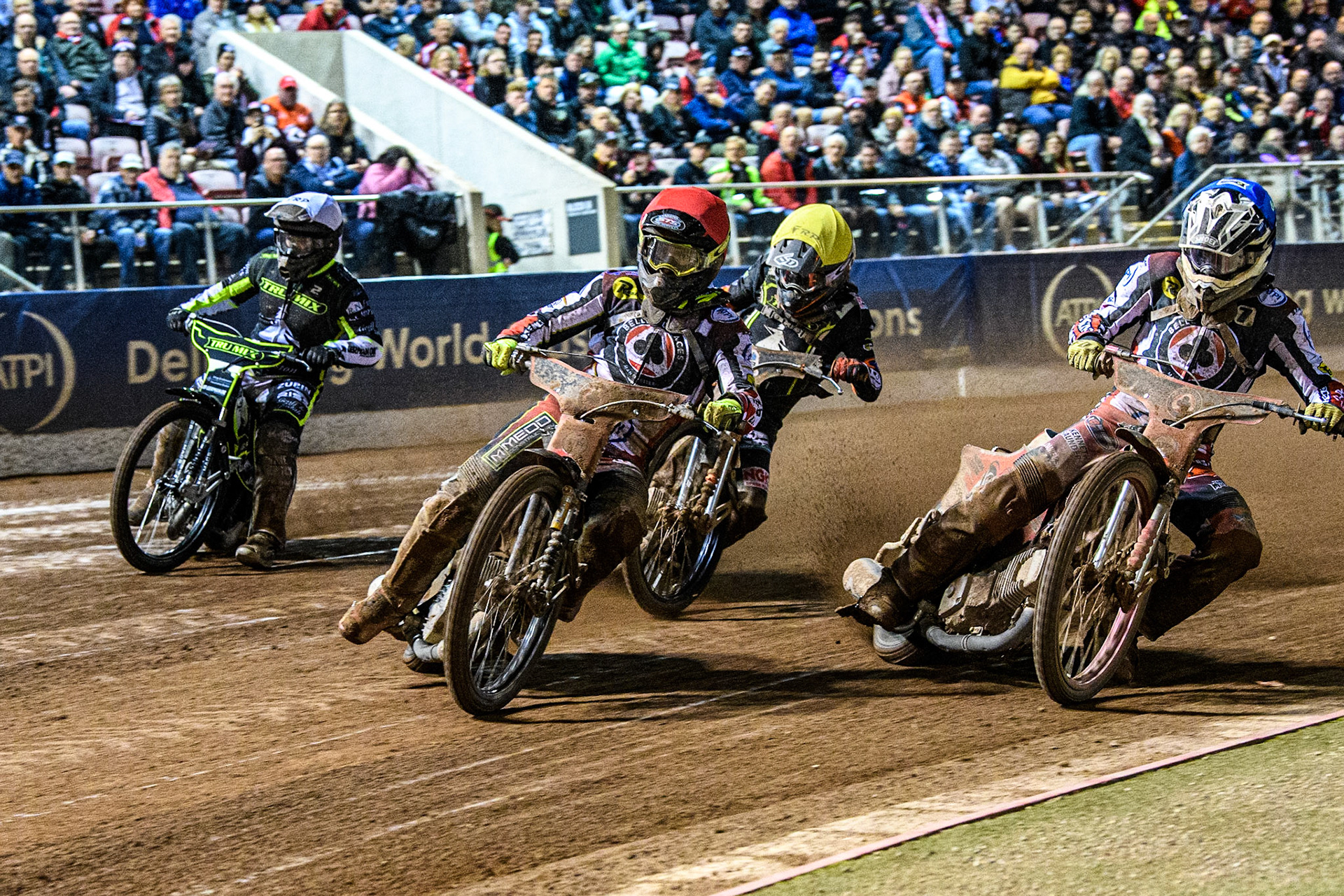 Tom Brennan (Red) and Connor Bailey (Blue) make the gate over Erik Riss (White) and Jack Smith (Yellow) during the Sports Insure Premiership Semi Final Playoff 2nd leg match between Belle Vue Aces and Ipswich Witches at the National Speedway Stadium, Manchester on Monday 25th September 2023. (Photo: Ian Charles | MI News)