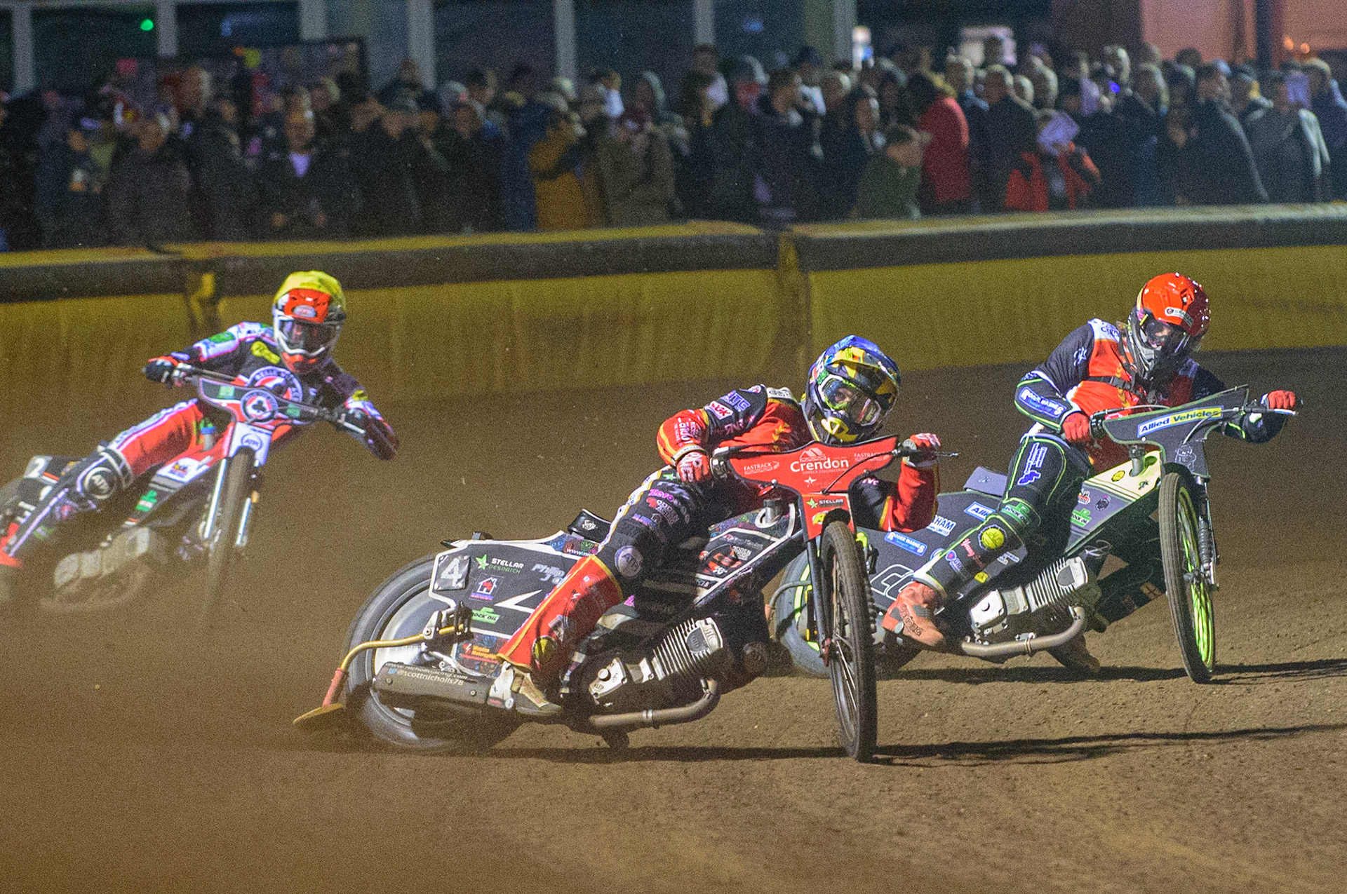 PETERBOROUGH, UK. OCT 14TH Scott Nicholls  (Blue) leads Craig Cook (Red) and Richie Worrall  (Yellow) during the SGB Premiership Grand Final 2nd leg between Peterborough and Belle Vue Aces at East of England Showground, Peterborough on Thursday 14th October 2021. (Credit: Ian Charles | MI News)