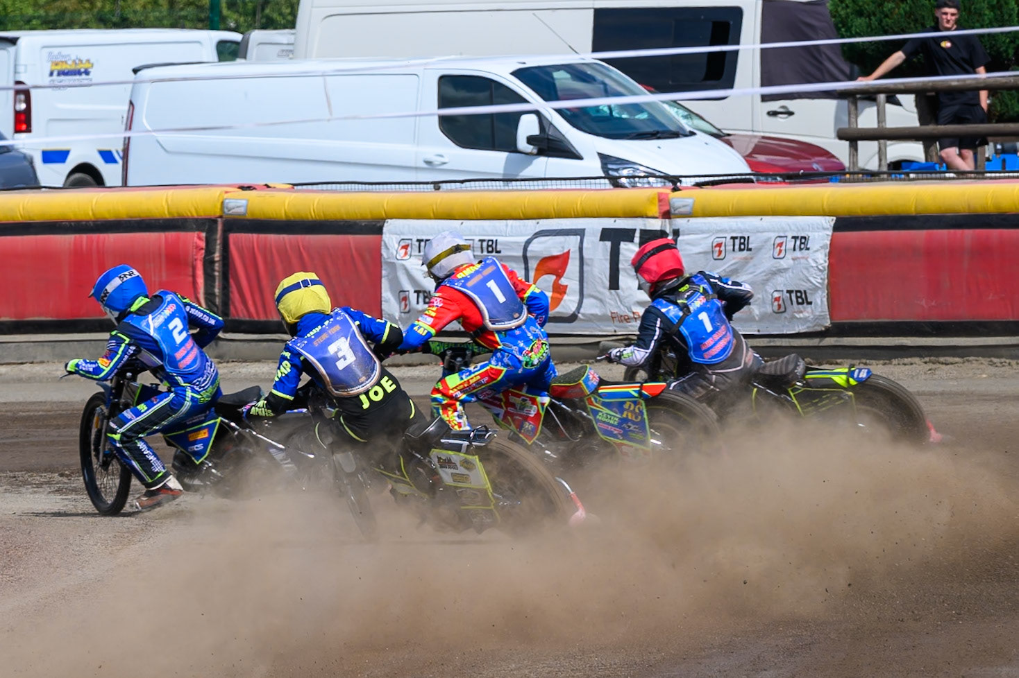 Dylan Huthwaite, Guest Rider for Kings Lynn Young Stars in Yellow chases Nathan Ablitt, Guest Rider for Buxton Bulls in Red , Simon Lambert of Kings Lynn Young Stars in White  and Arran Butcher of Buxton Bulls in Blue into the first turn during the WSRA National Development League match between Buxton Bulls and King's Lynn Young Stars at Hi-Edge Speedway, Buxton on Sunday 9th August 2026. (Photo: Ian Charles | MI News)