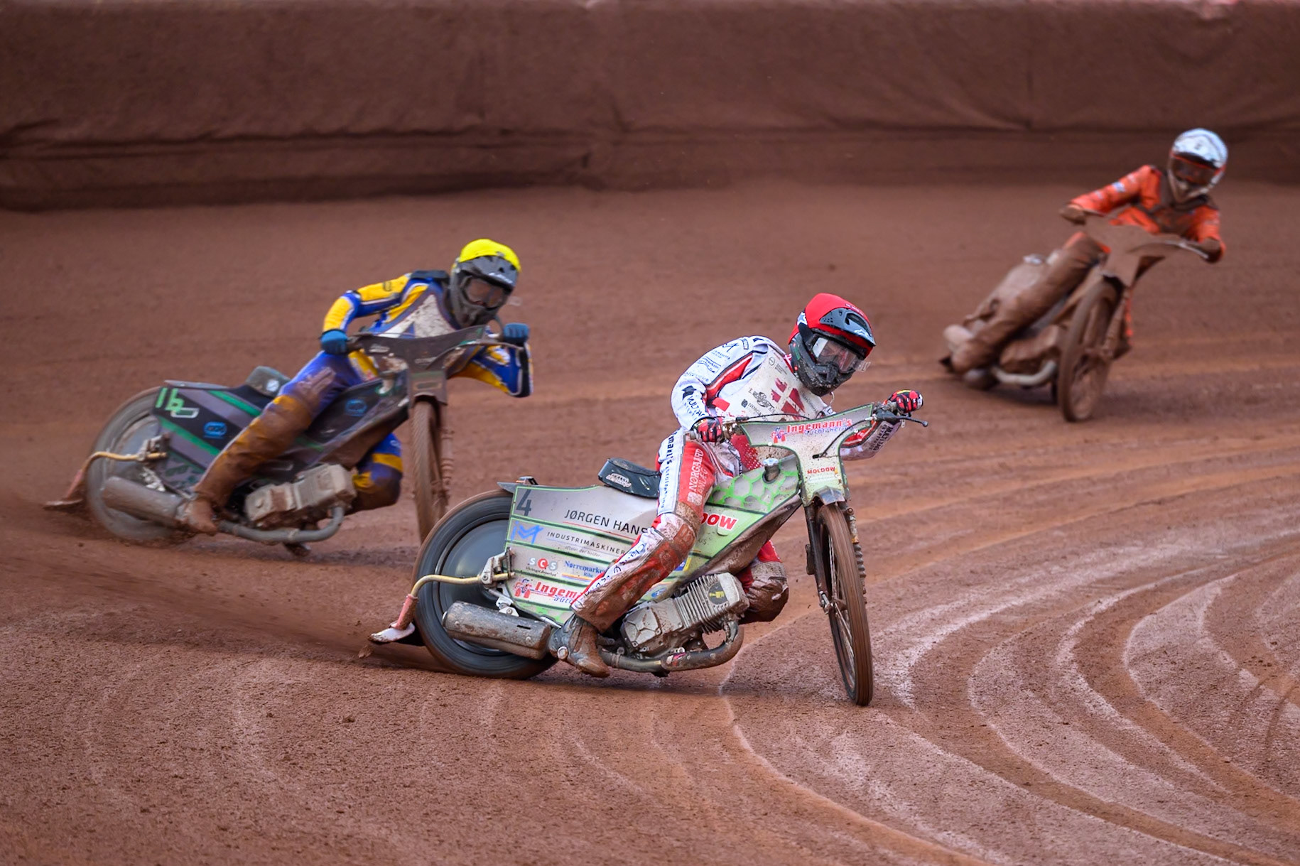 Jonas Knudsen of Denmark in Red leading Daniel Klima of Czechia in Yellow and Sven Cerjak of Slovenia in White during the Speedway GP Qualifying Round 3 at Allied Ashfield Stadium, Glasgow on Saturday 30th May 2026. (Photo: Ian Charles | MI News)