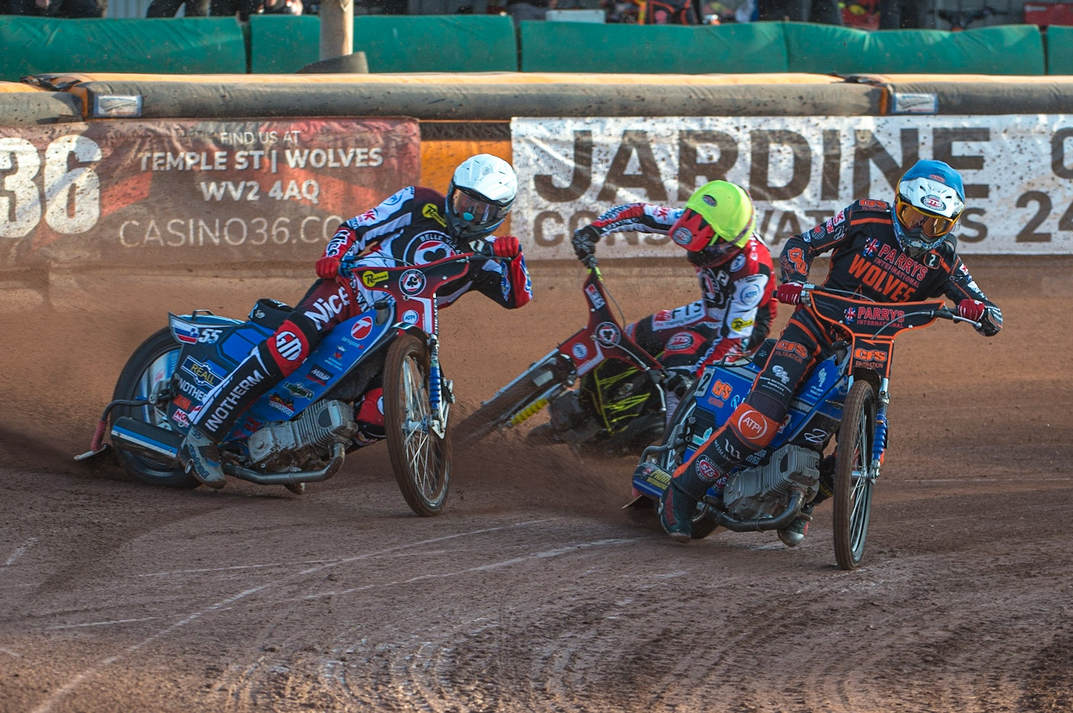 WOLVERHAMPTON, UK. JUN 20TH Steve Worrall  (Blue) leads Matej Zagar   as Jye Etheridge  gets out of shape during the SGB Premiership match between Wolverhampton Wolves and Belle Vue Aces at Monmore Green Stadium, Wolverhampton on Monday 20th June 2022. (Credit: Ian Charles | MI News)