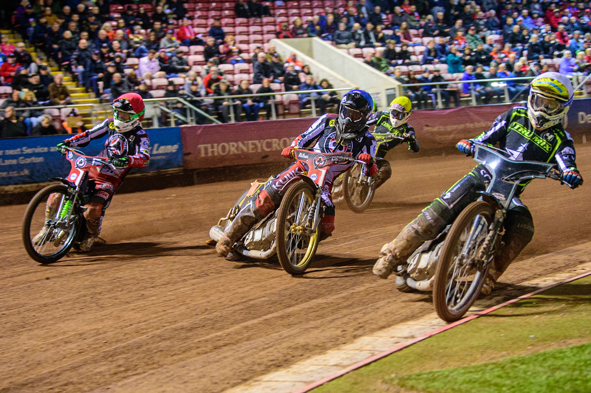 Rohan Tungate  (White) inside Jye Etheridge  (Blue) and Charles Wright  (Red) with Anders Rowe  (Yellow) behind during the SGB Premiership Semi Final 2nd Leg between Belle Vue Aces and Ipswich Witches at the National Speedway Stadium, Manchester on Monday 3rd October 2022. (Credit: Ian Charles | MI News)