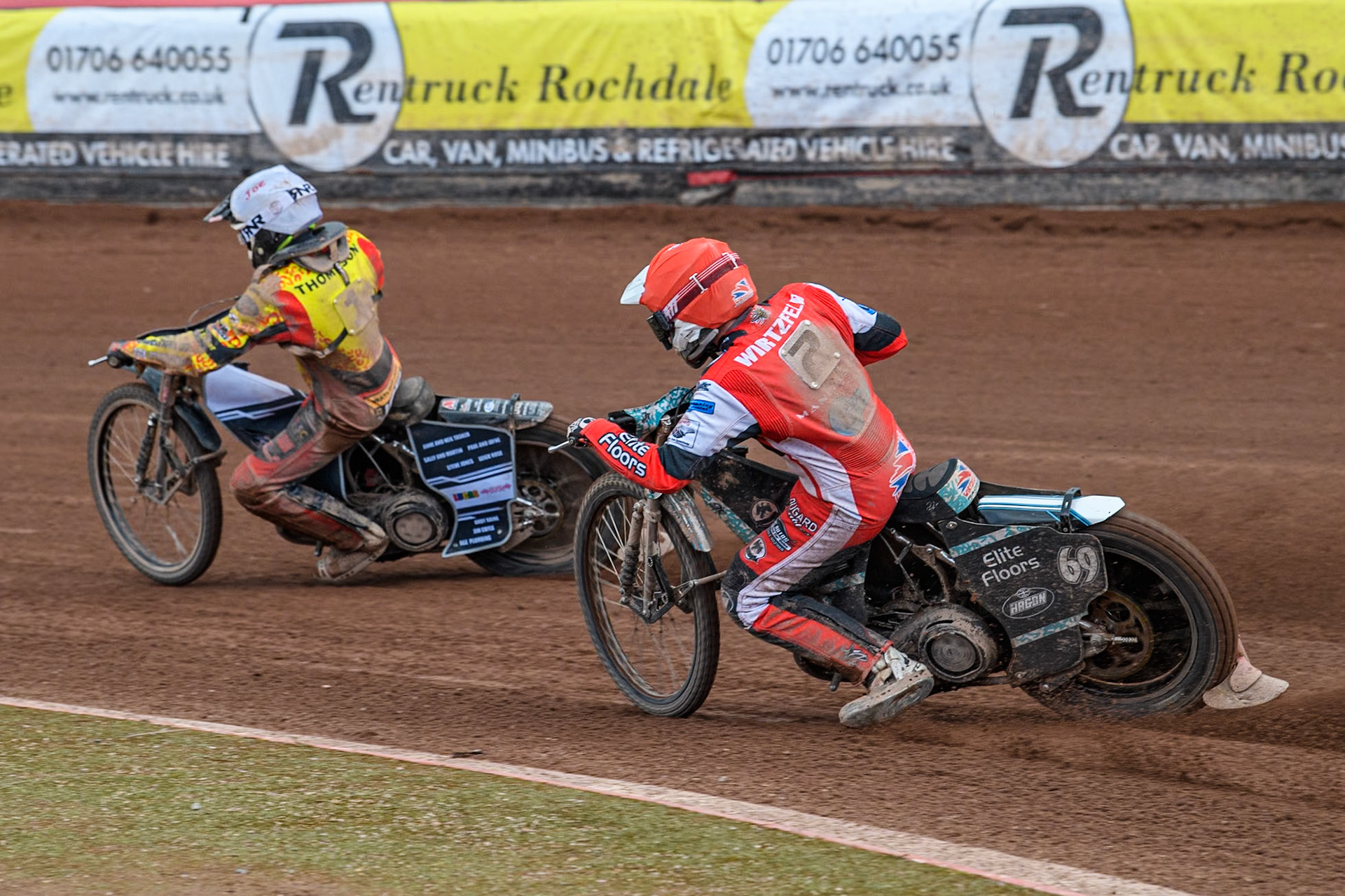 Belle Vue Colts' Chad Wirtzfeld (Red) chases Leicester Lion Cubs' Joe Thompson (White) during the WSRA National Development League match between Belle Vue Colts and Leicester Lion Cubs at the National Speedway Stadium, Manchester on Friday 29th March 2024. (Photo: Ian Charles | MI News)