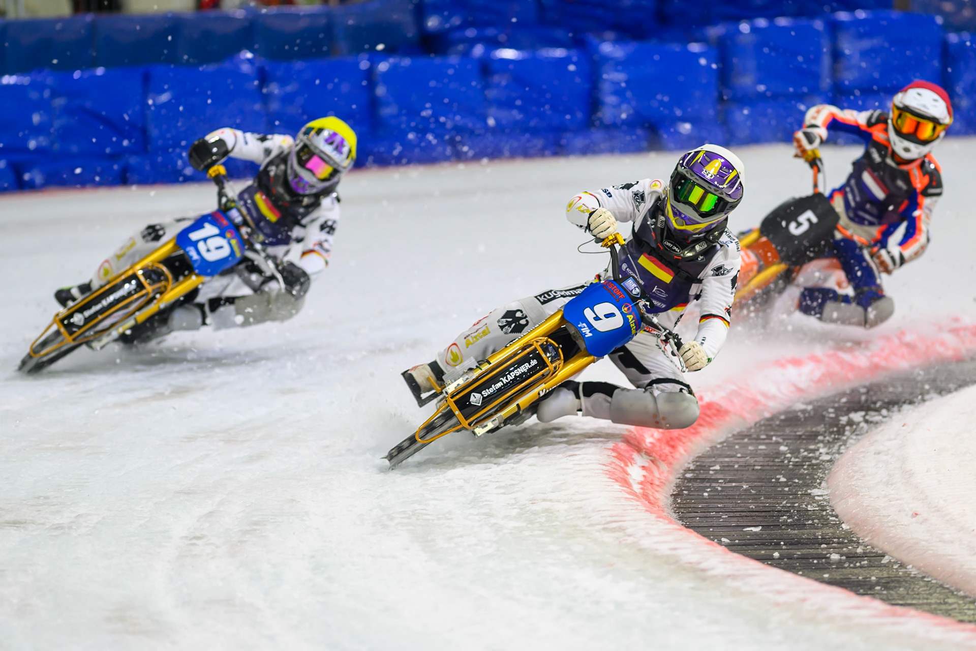 Netherlands v Germany: Max Niedermaier (9) of Germany  in White and Maximillian Niedermaier (19) of Germany  in Yellow leading Jasper Iwema (5) of The Netherlands  in Red during the FIM Ice Speedway Of Nations at Ice Rink Thialf, Heerenveen on Sunday 12th April 2026. (Photo: Ian Charles | MI News)