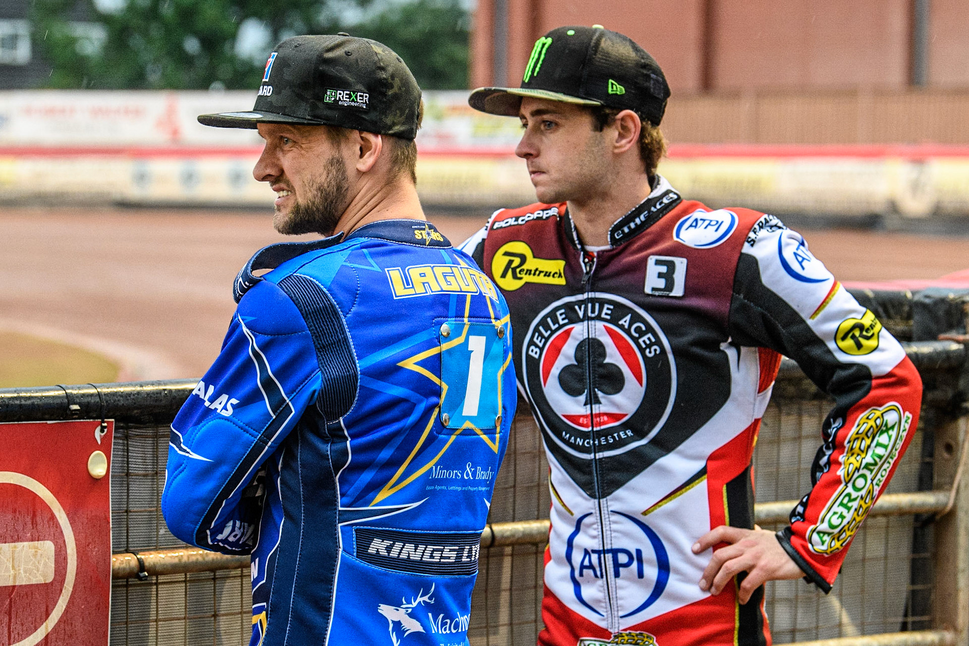 Artem Laguta (left) and Jaimon Lidsey watch the track prep after the rain during the Sports Insure Premiership match between Belle Vue Aces and King's Lynn Stars at the National Speedway Stadium, Manchester on Monday 12th June 2023. (Photo: Ian Charles | MI News)