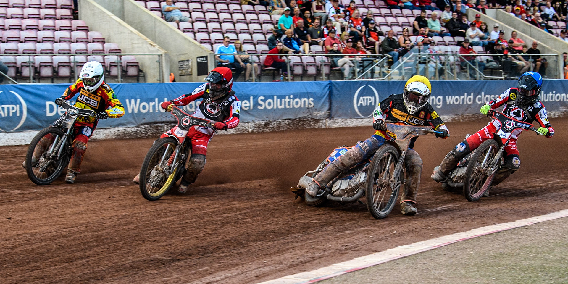 (L to R) Leicester Lions' Richard Lawson in White, Belle Vue Aces' Norick Blodorn in Red, Leicester Lions' Guest rider Luke Killeen in Yellow and Belle Vue Aces' Connor Bailey in Blue during the Rowe Motor Oil Premiership match between Belle Vue Aces and Leicester Lions at the National Speedway Stadium, Manchester on Monday 24th June 2024. (Photo: Ian Charles | MI News)