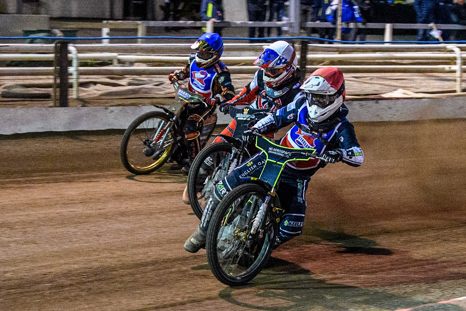 Steelers' Nathan Ablitt in Red leading Belle Vue Colts' Freddy Hodder in White and Steelers' Luke Harris in Blue in the re-run of Heat 6 during the WSRA National Development League match between Steelers and Belle Vue Colts at Owlerton Stadium, Sheffield on Monday 5th May 2025. (Photo: Ian Charles | MI News)