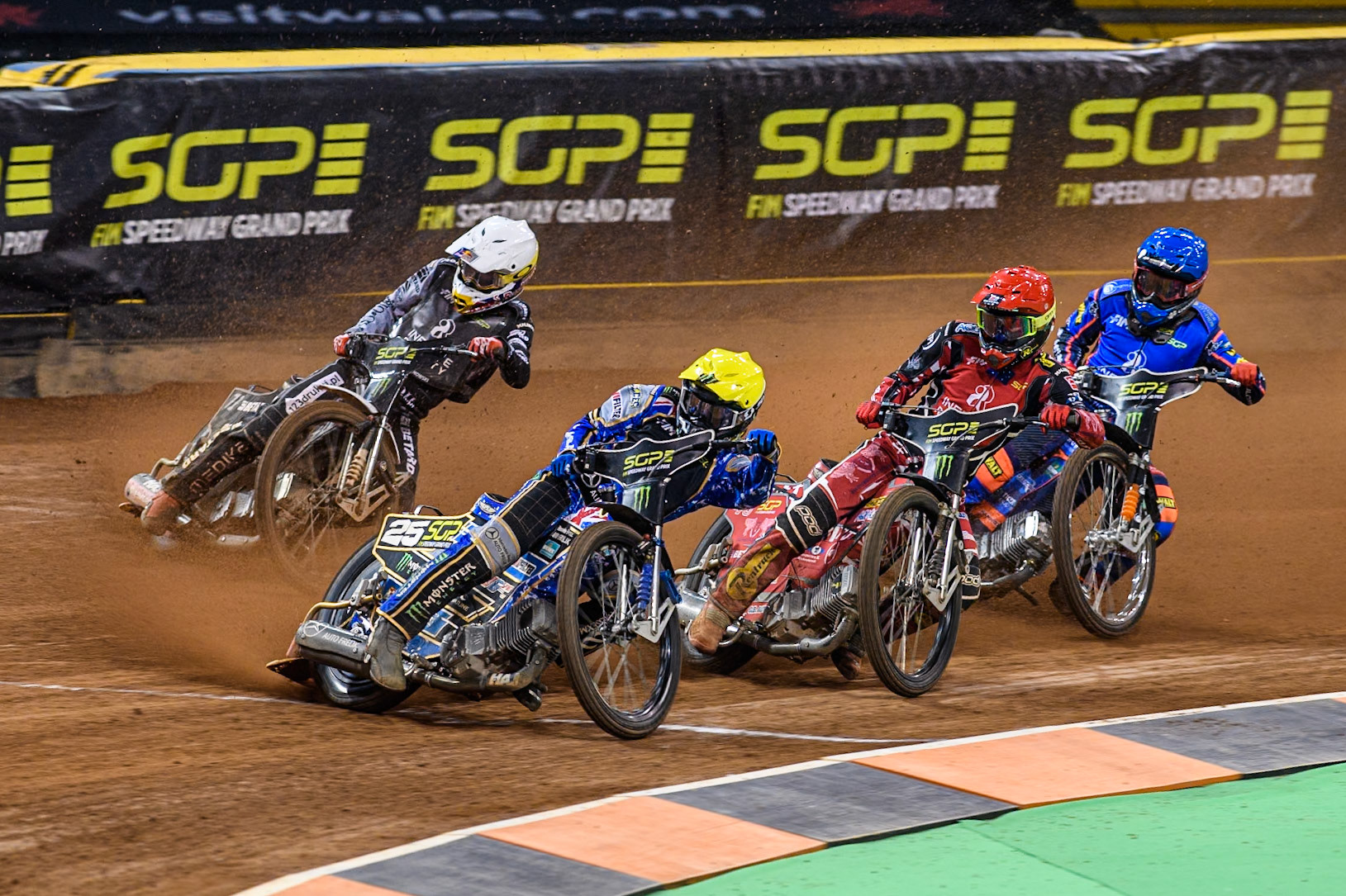 Jack Holder (25) of Australia in Yellow leading Max Fricke (46) of Australia in Red Maciej Janowski (71) of Poland in White and Andzejs Lebedevs (29) of Latvia in Blue during the FIM Speedway Grand Prix of Great Britain at The Principality Stadium, Cardiff on Saturday 17th August 2024. (Photo: Ian Charles | MI News)