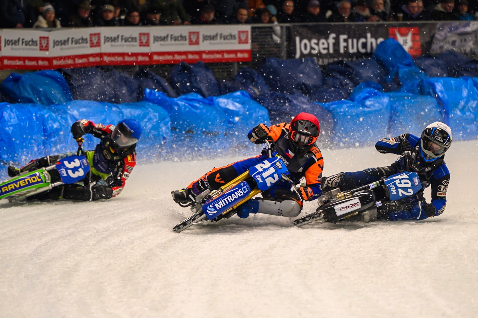 Niclas Svensson (192) of Sweden  in White shoves Lukas Hutla (212) of Czechia in Red out to pass him with Johann Weber (33) of Germany  in Blue on the outside during the Ice Speedway Gladiators World Championship Final 1 at Max-Aicher-Arena, Inzell on Saturday 14th March 2026. (Photo: Ian Charles | MI News)