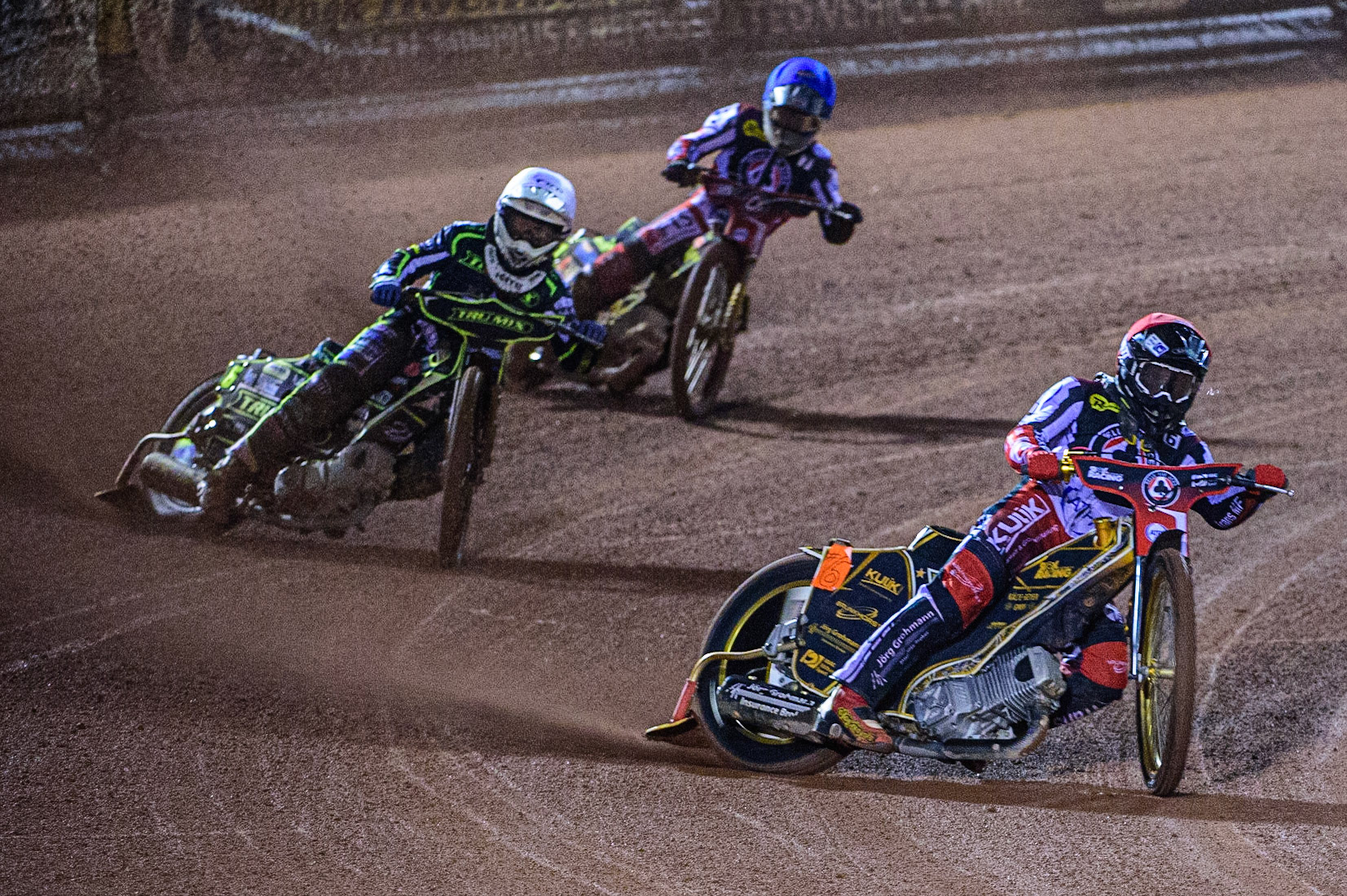 Norick Blodorn  (Red) leads Paul Starke  (White) and Anders Rowe (Yellow) during the SGB Premiership Semi Final 2nd Leg between Belle Vue Aces and Ipswich Witches at the National Speedway Stadium, Manchester on Monday 3rd October 2022. (Credit: Ian Charles | MI News)