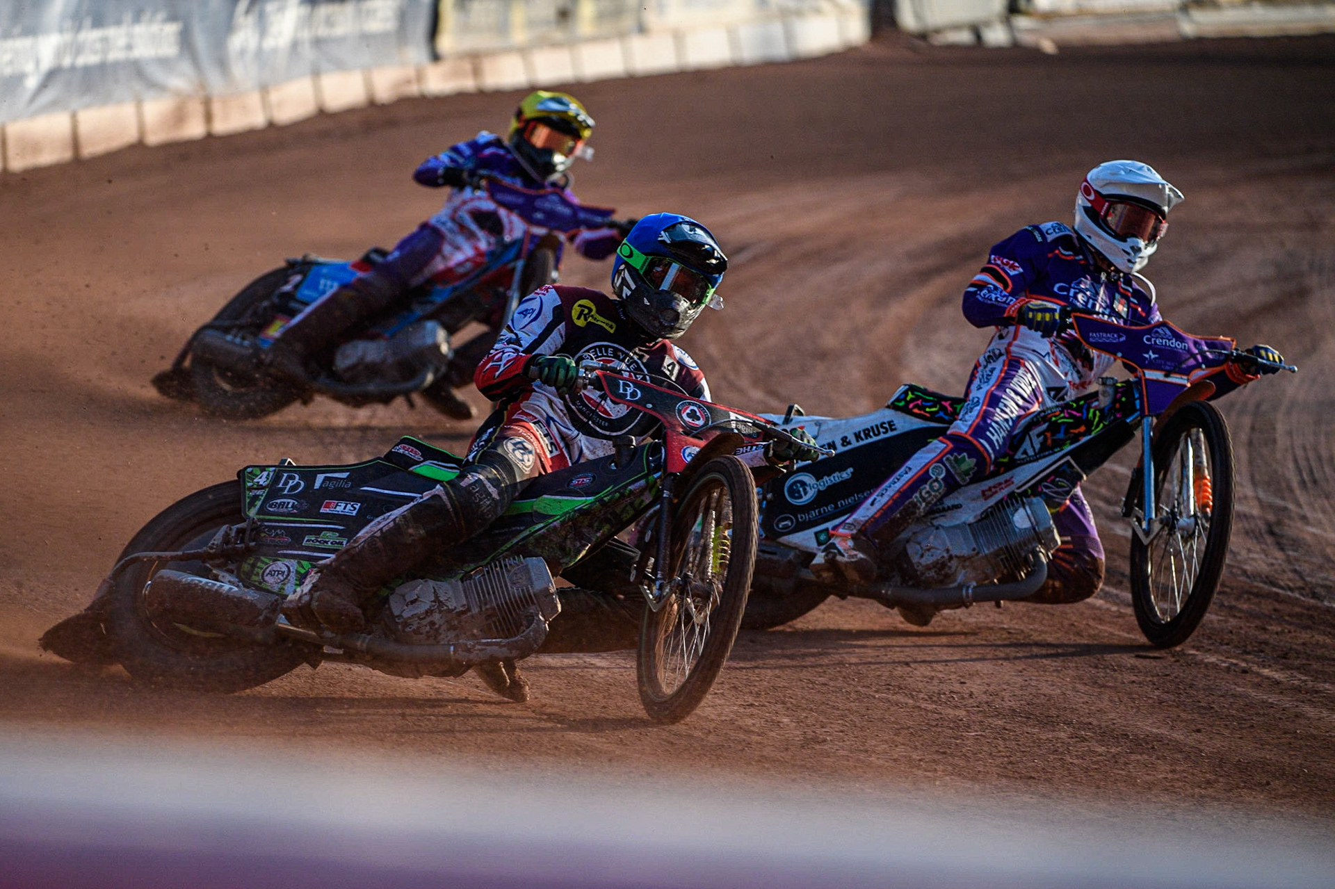 Charles Wright (Blue) outside Niels-Kristian Iversen  (White) with Ben Cook (Yellow) behind during the Sports Insure Premiership match between Belle Vue Aces and Peterborough at the National Speedway Stadium, Manchester on Monday 19th June 2023. (Photo: Ian Charles | MI News)