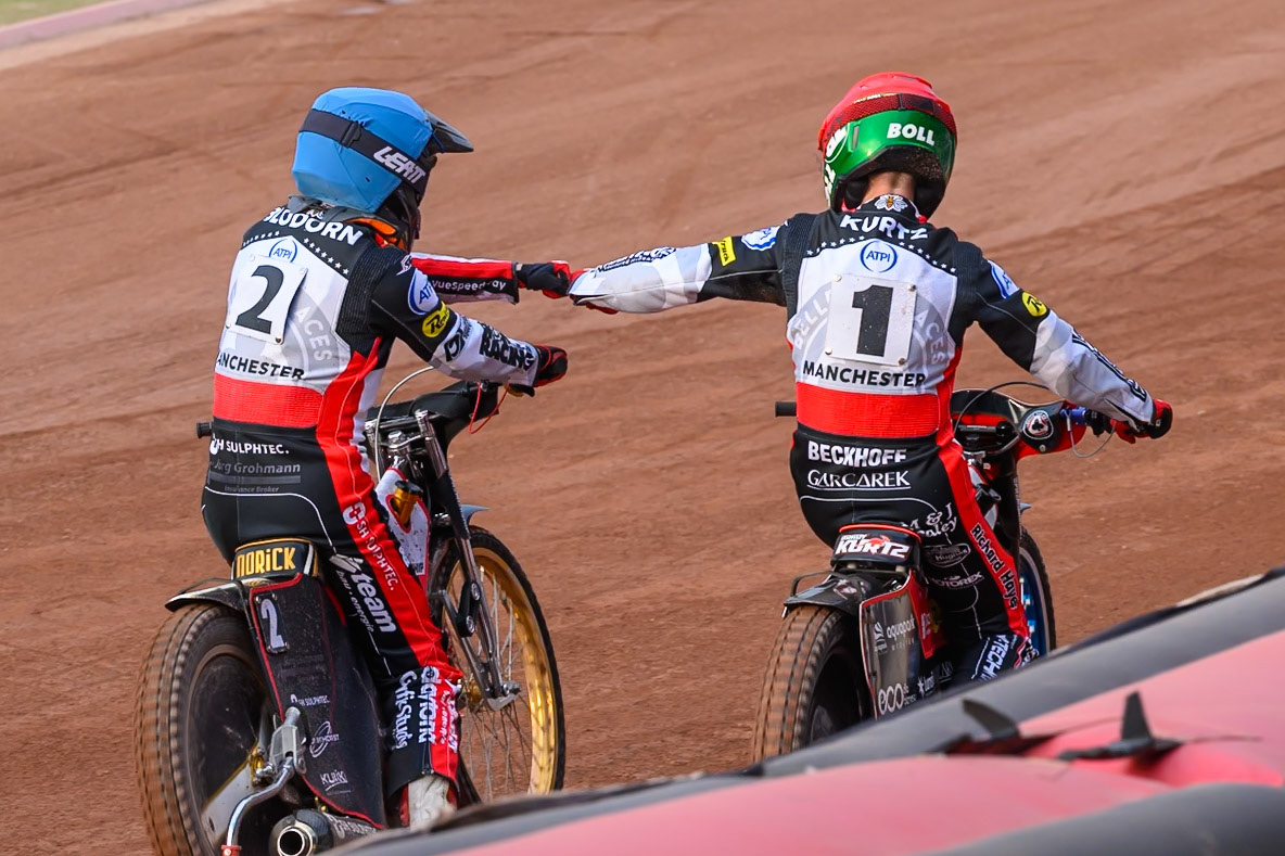 Norick Blödorn of Belle Vue Aces in Blue and Brady Kurtz of Belle Vue Aces celebrate their maximum points win in heat 1 during the Rowe Motor Oil Premiership match between Belle Vue Aces and Leicester Lions at the National Speedway Stadium, Manchester on Monday 3rd August 2026. (Photo: Ian Charles | MI News)