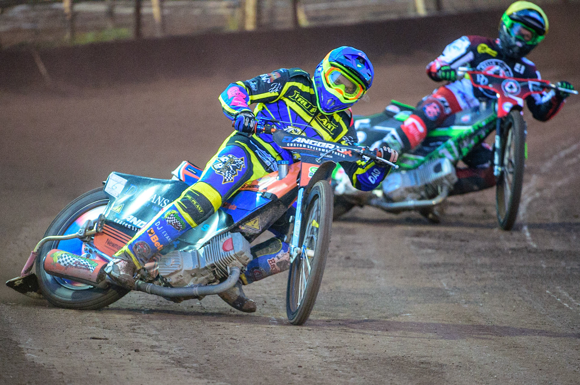 SHEFFIELD, UK. APR 14TH   Stefan Nielsen   (Blue) leads Charles Wright  (Yellow) during the SGB Premiership League Cup match between Sheffield Tigers and Belle Vue Aces at Owlerton Stadium, Sheffield on Thursday 14th April 2022. (Credit: Ian Charles | MI News)