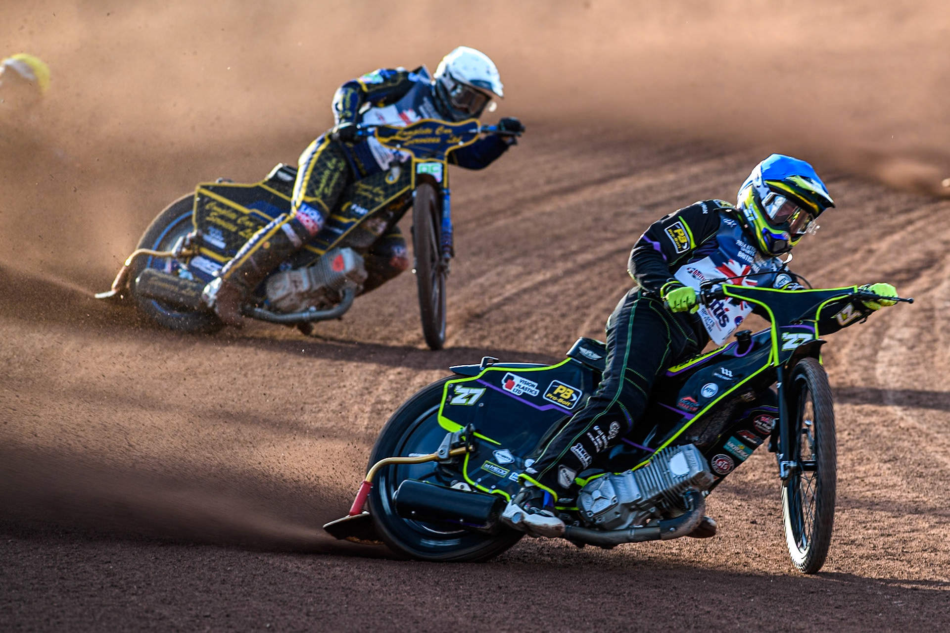 Tom Brennan in Blue leading Kyle Howarth in White during the Attis Insurance Sports Division British Speedway Championship Final at the National Speedway Stadium, Manchester on Saturday 8th June 2024. (Photo: Ian Charles | MI News)