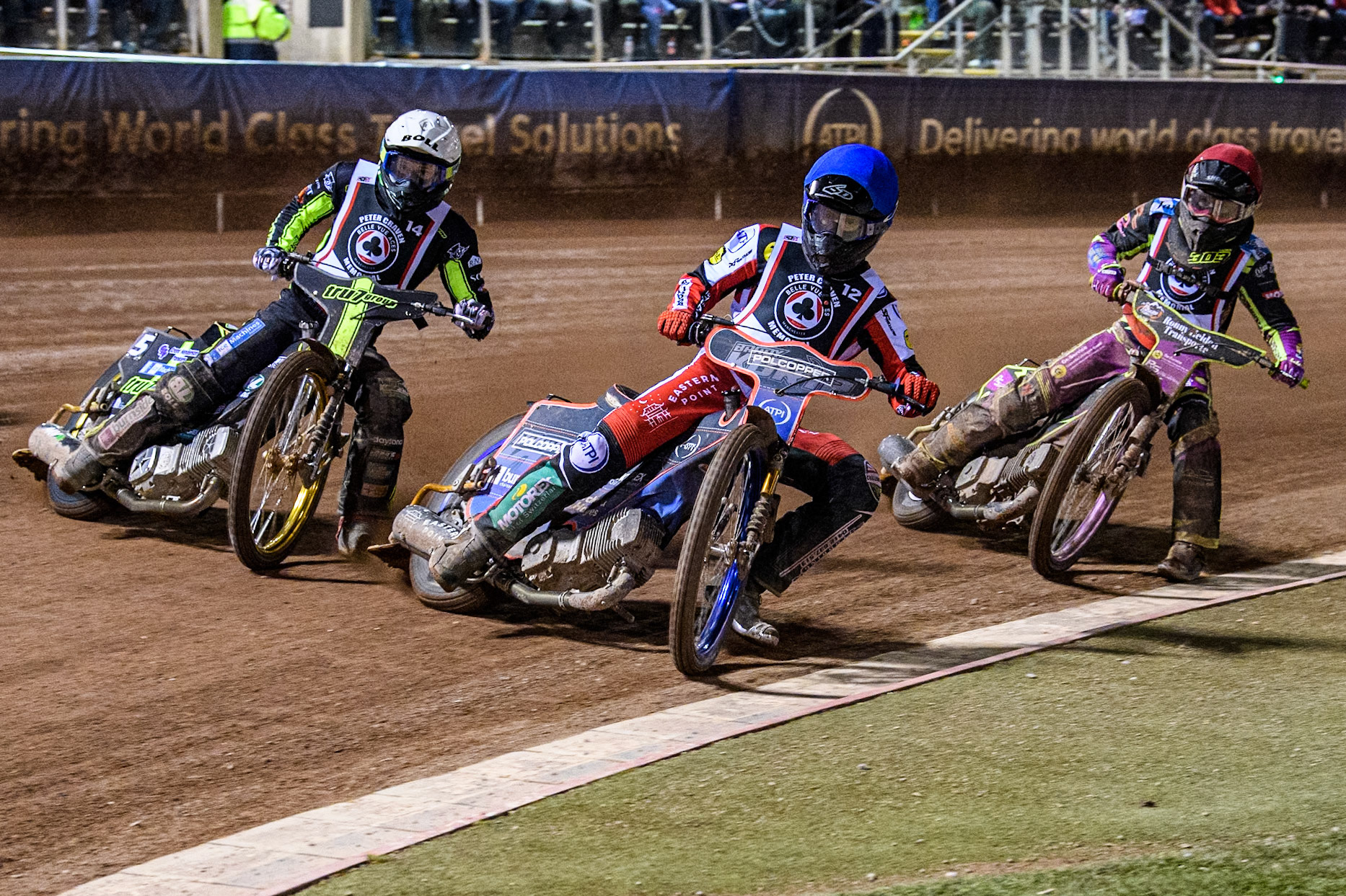 Australia's Brady Kurtz (Blue) leads  Australia's Jason Doyle (White) and Germany's Celina Liebmann (Red) during the Peter Craven Memorial Trophy meeting at the National Speedway Stadium, Manchester on Monday 18th March 2024. (Photo: Ian Charles | MI News)