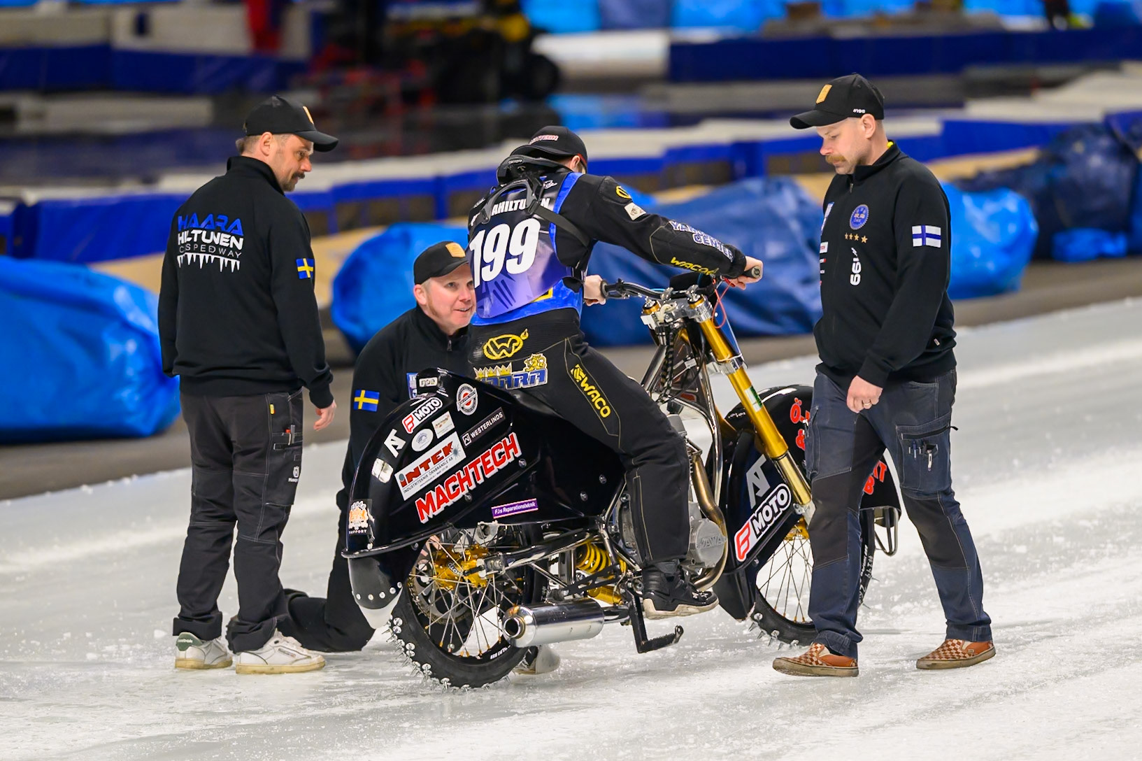 Haarahiltnen's team restart the bike during the Ice Speedway Gladiators World Championship Final 1 at Max-Aicher-Arena, Inzell on Saturday 14th March 2026. (Photo: Ian Charles | MI News)