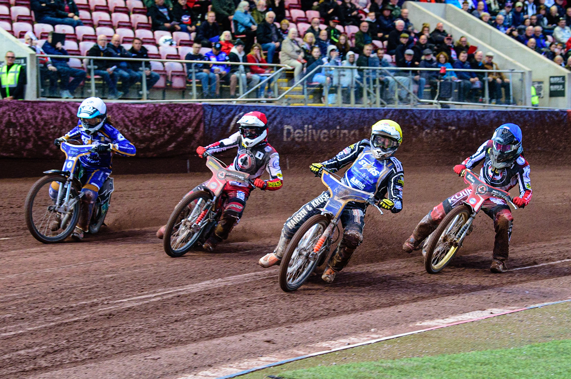 MANCHESTER, UK. MAY 16TH  Niels-Kristian Iversen  (Yellow) inside Max Fricke  (Red) and Richard Lawson  (White) with \bvc6\ (Blue) behindduring the SGB Premiership match between Belle Vue Aces and King's Lynn Stars at the National Speedway Stadium, Manchester on Monday 16th May 2022. (Credit: Ian Charles | MI News)