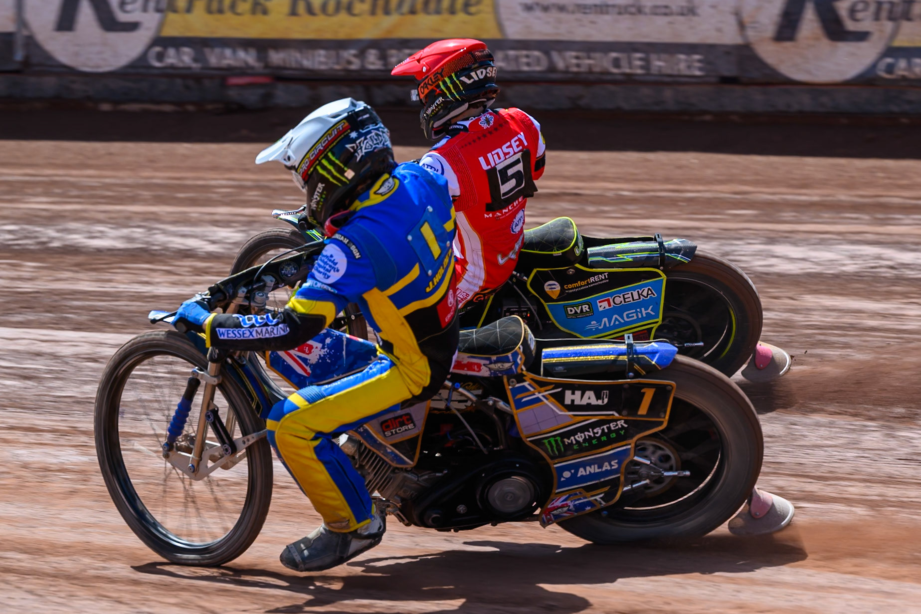 Jack Holder of Sheffield Tigers in White rides inside Jaimon Lidsey, Guest Rider for Belle Vue Aces in Red during the Rowe Motor Oil Premiership match between Belle Vue Aces and Sheffield Tigers at the National Speedway Stadium, Manchester on Monday 25th May 2026. (Photo: Ian Charles | MI News)