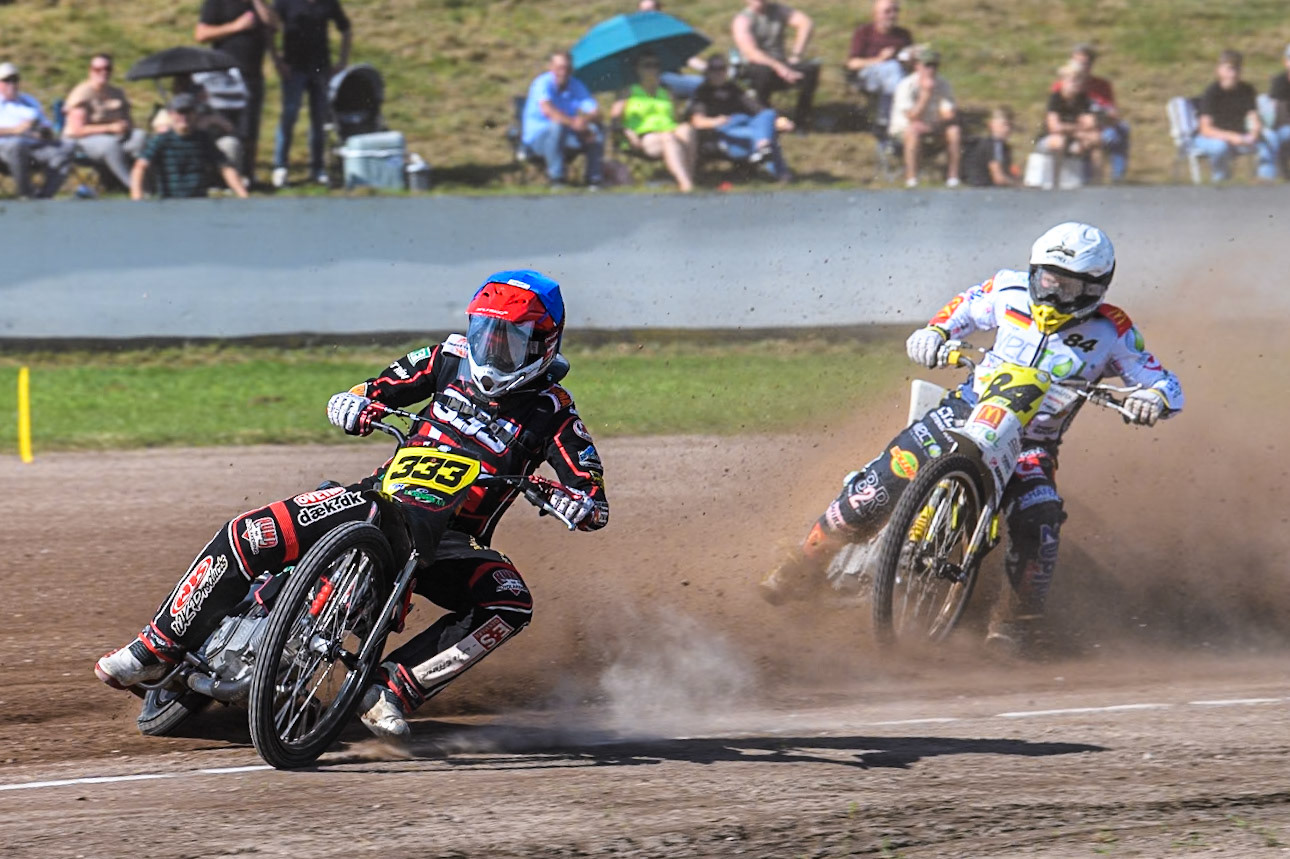 Kenneth Kruse Hansen (333) of Denmark in Blue leading Martin Smolinski (84) of Germany in White during the FIM Long Track World Championship Final 5 at the Speed Centre Roden, Roden, Netherlands on Sunday 22nd September 2024. (Photo: Ian Charles | MI News)