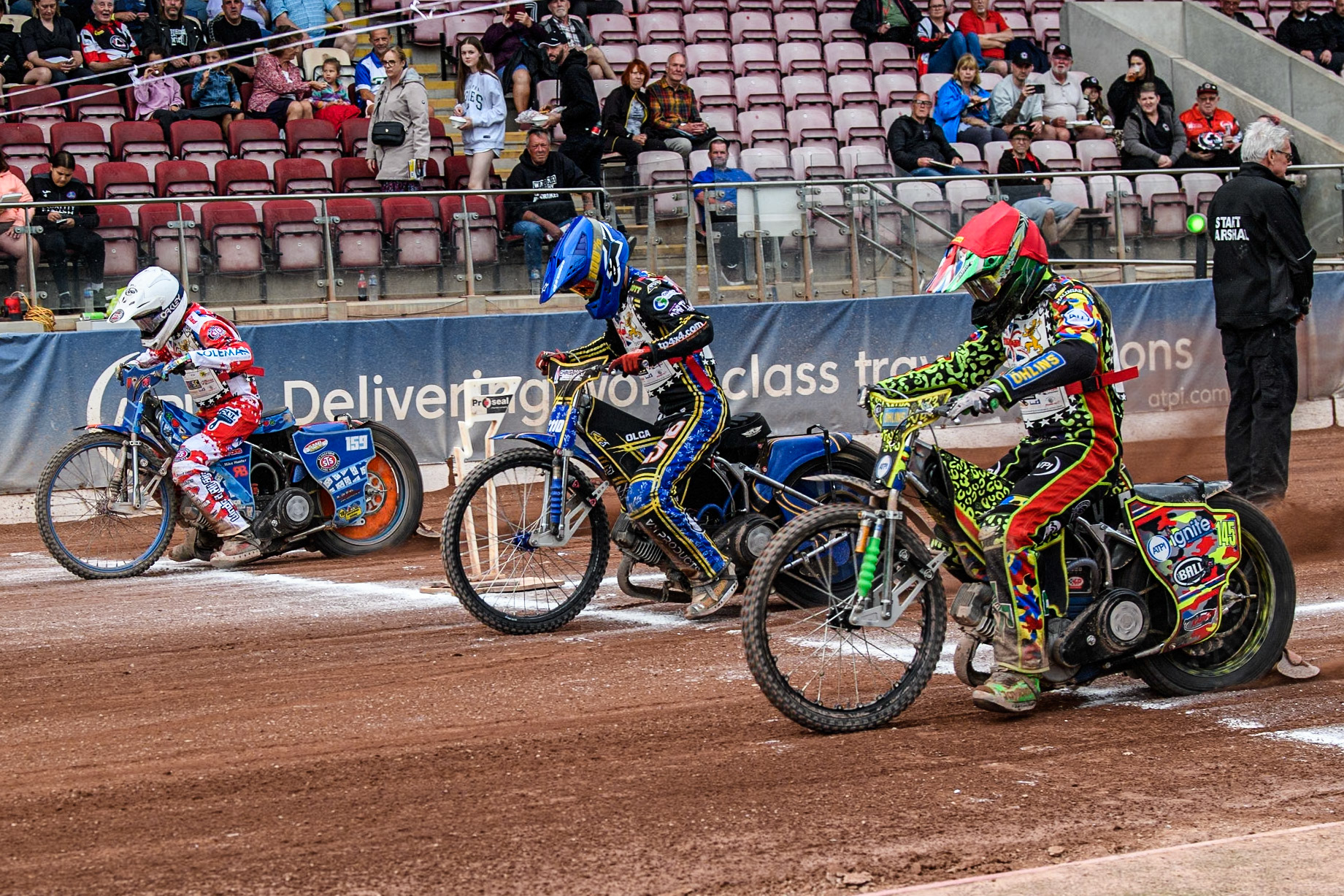 500cc Final: (L to R) Stene Pijper (500cc)  in White, William Hocaniuk  (500cc)  in Blue and William Cairns (500cc)  in Red during the British Youth 500cc Championships at the National Speedway Stadium, Manchester on Friday 2nd August 2024. (Photo: Ian Charles | MI News)