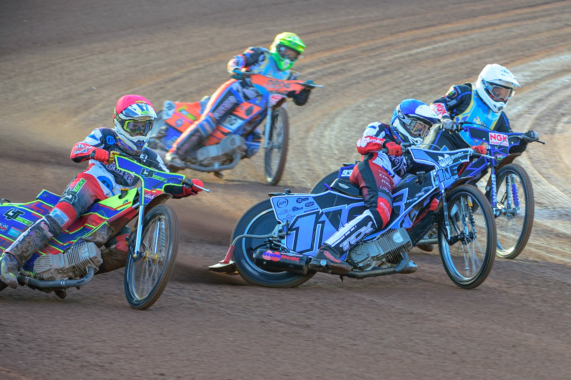MANCHESTER, UK. MAY 27TH  Sam McGurk  (Blue) outside Tom Woolley  (White) with Nathan Ablitt  (Red) on the outside and Josh Embleton  (Yellow) behind during the National Development League match between Belle Vue Colts and Armadale Devils at the National Speedway Stadium, Manchester on Friday 27th May 2022. (Credit: Ian Charles | MI News)