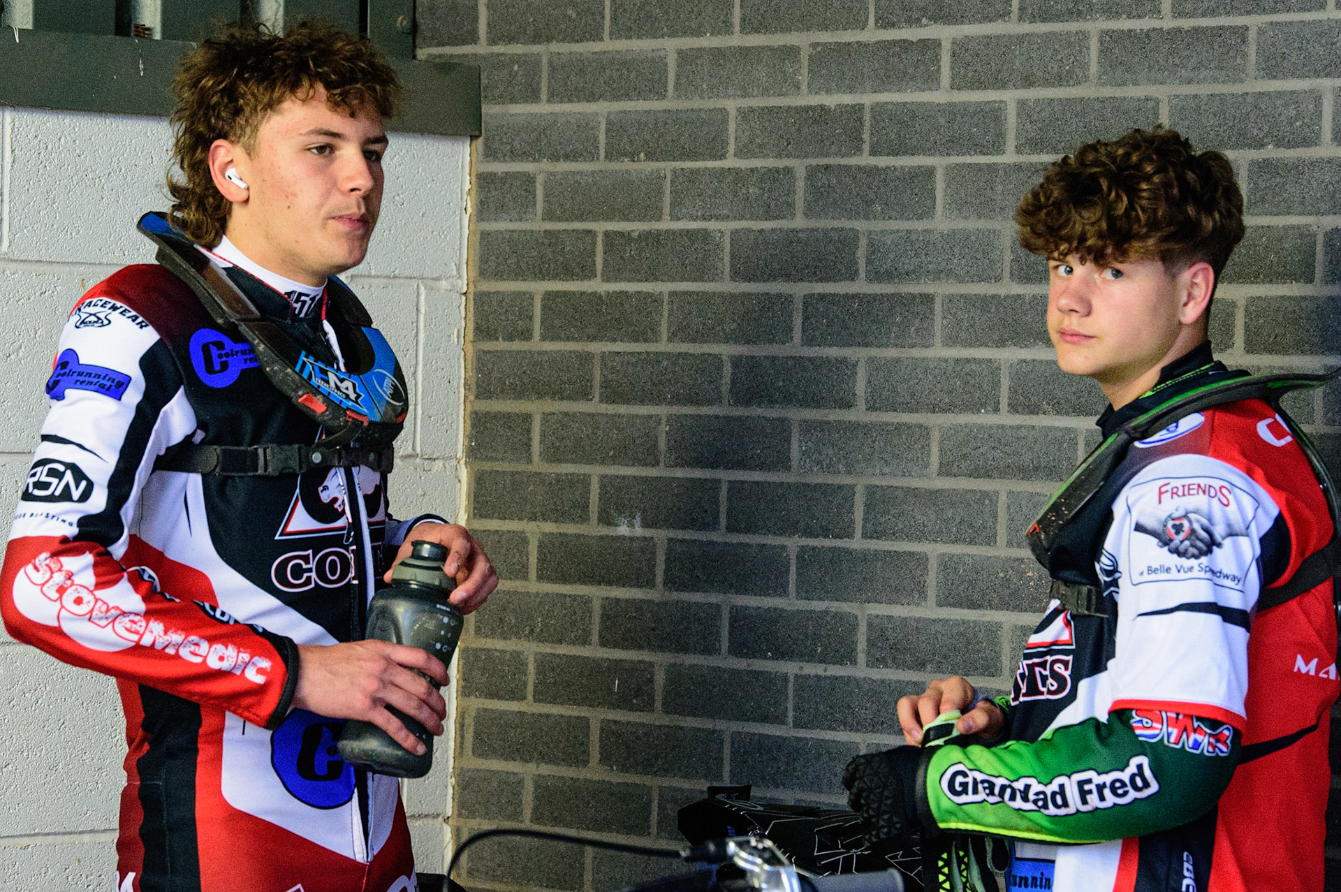 MANCHESTER, UK. JUN 24TH  Harry McGurk  (left) chats with Luke Harrison during the National Development League match between Belle Vue Colts and Berwick Bullets at the National Speedway Stadium, Manchester on Friday 24th June 2022. (Credit: Ian Charles | MI News)
