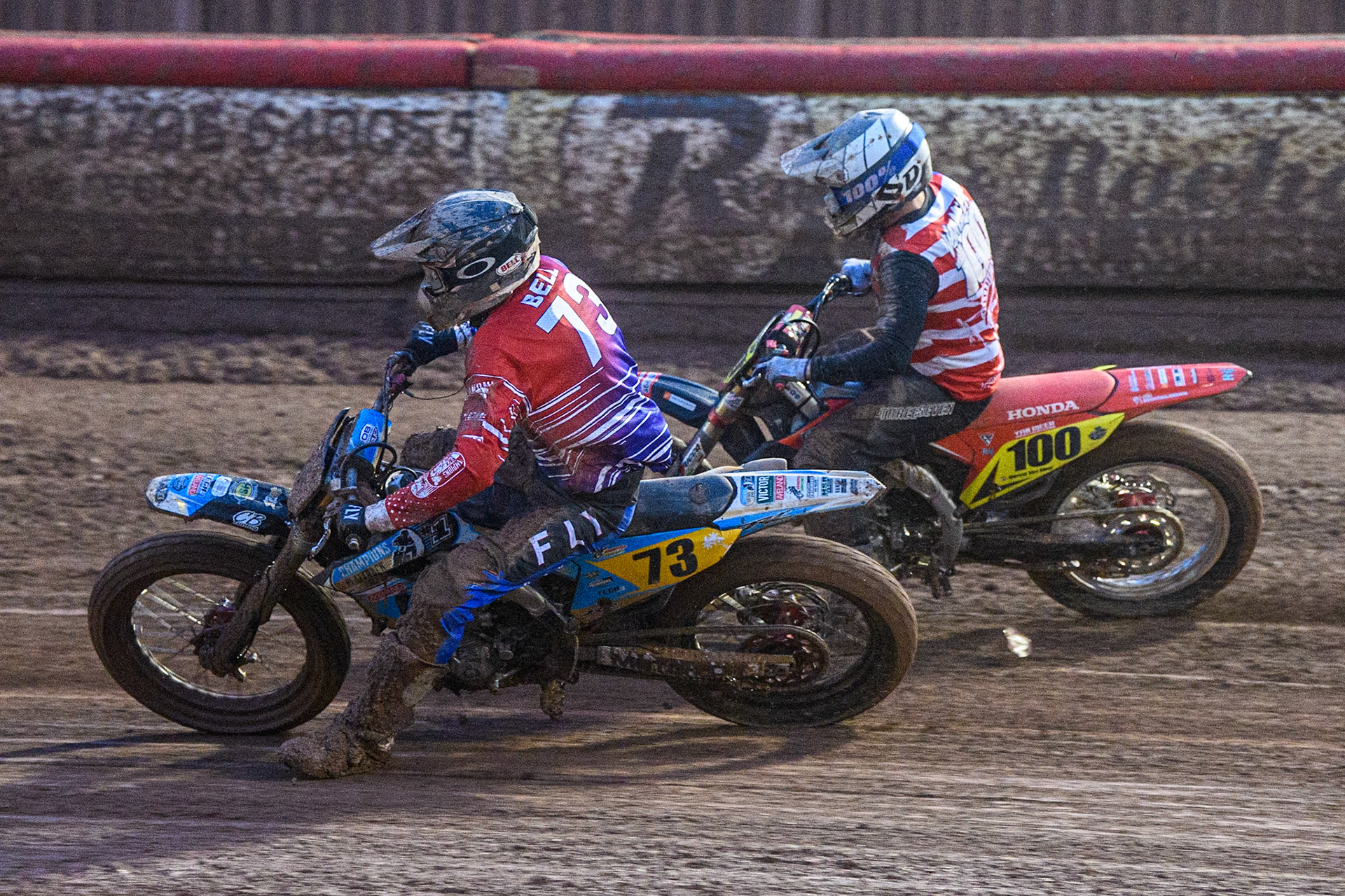 Jack Bell (73) from Great Britain passes Menno Van Meer (100) from Netherlands during the FIM World Flat Track Championship Round 1 at the National Speedway Stadium, Manchester on Saturday 5th August 2023. (Photo: Ian Charles | MI News)