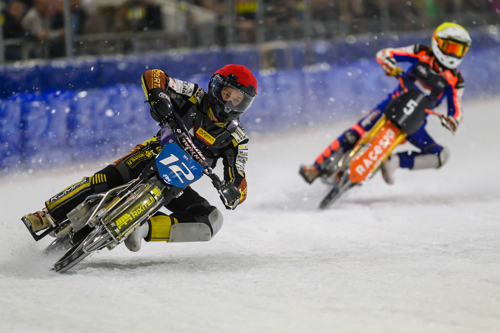Heikki Huusko (12) of Finland  in Red leading Jasper Iwema (5) of The Netherlands  in Yellow during the FIM Ice Speedway Of Nations at Ice Rink Thialf, Heerenveen on Sunday 12th April 2026. (Photo: Ian Charles | MI News)