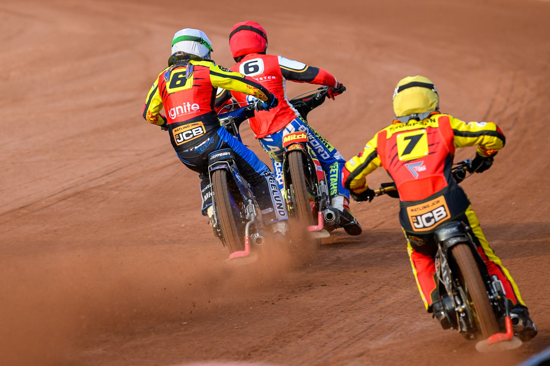 Joe Thompson of Leicester Lions in Yellow chases Jonas Jeppesen Guest rider for Leicester Lions in White and Mitch McDiarmid, Guest Rider for Belle Vue Aces in Red during the Rowe Motor Oil Premiership match between Belle Vue Aces and Leicester Lions at the National Speedway Stadium, Manchester on Monday 3rd August 2026. (Photo: Ian Charles | MI News)