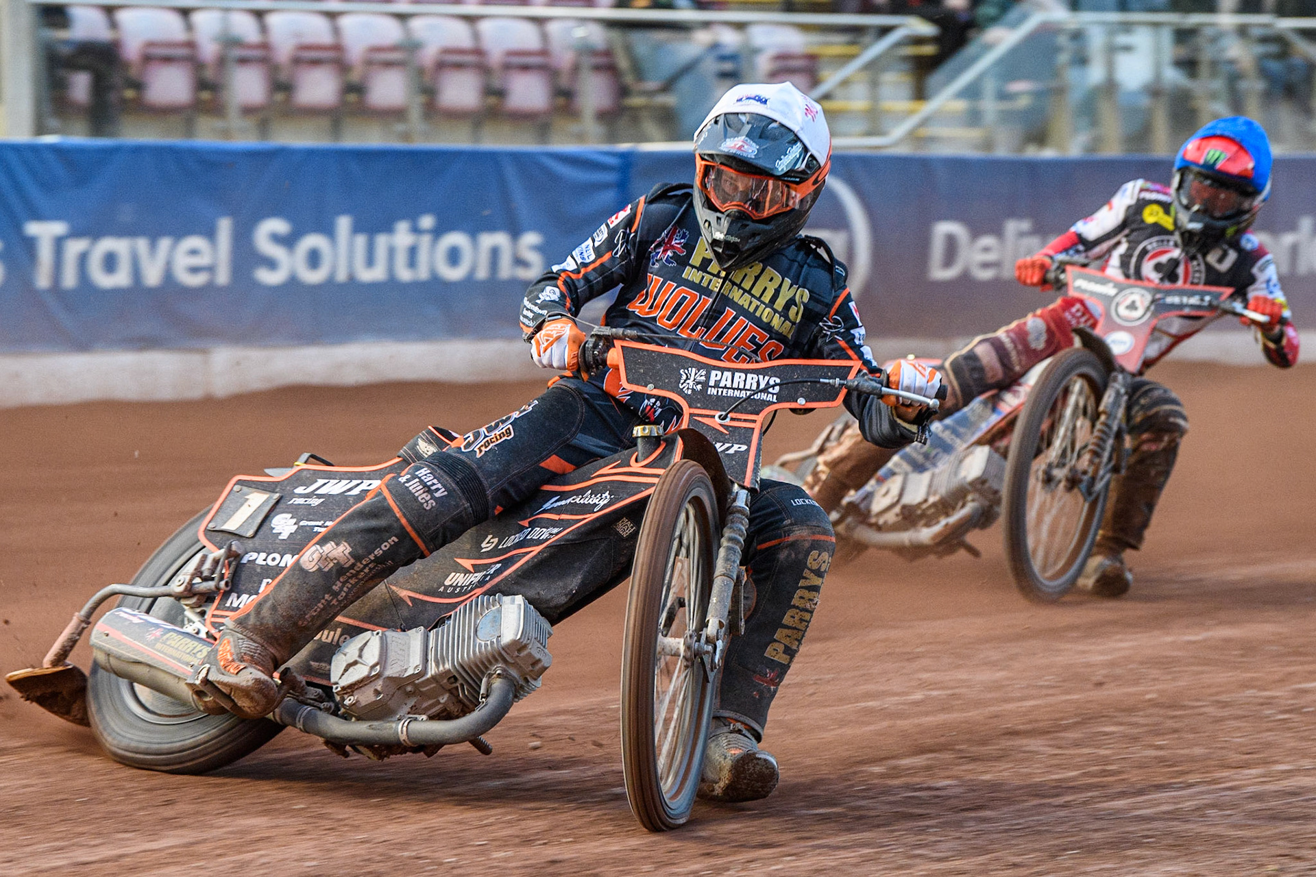 Sam Masters (White) leads Dan Bewley (Blue) during the Sports Insure Premiership match between Belle Vue Aces and Wolverhampton Wolves at the National Speedway Stadium, Manchester on Monday 3rd July 2023. (Photo: Ian Charles | MI News)
