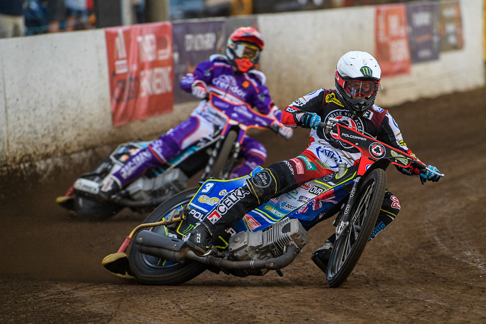 Jaimon Lidsey (White) leads Benjamin Basso (Red) during the Sports Insure Premiership match between Peterborough and Belle Vue Aces at East of England Showground, Peterborough on Monday 26th June 2023. (Photo: Ian Charles | MI News)