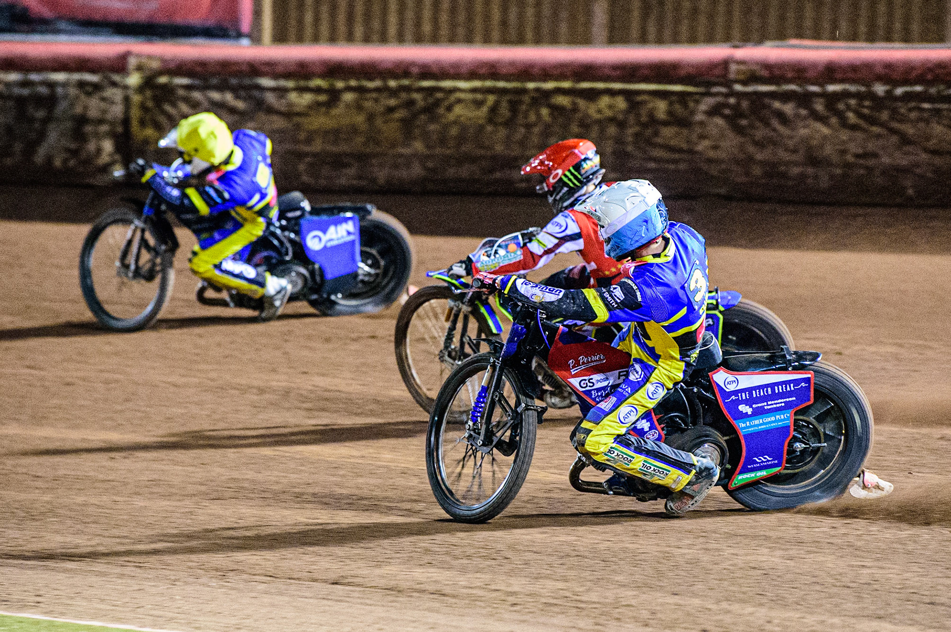 Adam Ellis  (White) chases Jaimon Lidsey  (Red) and Lewis Kerr  (Yellow) during the SGB Premiership match between Belle Vue Aces and Sheffield Tigers at the National Speedway Stadium, Manchester on Monday 27th March 2023. (Photo: Ian Charles | MI News)