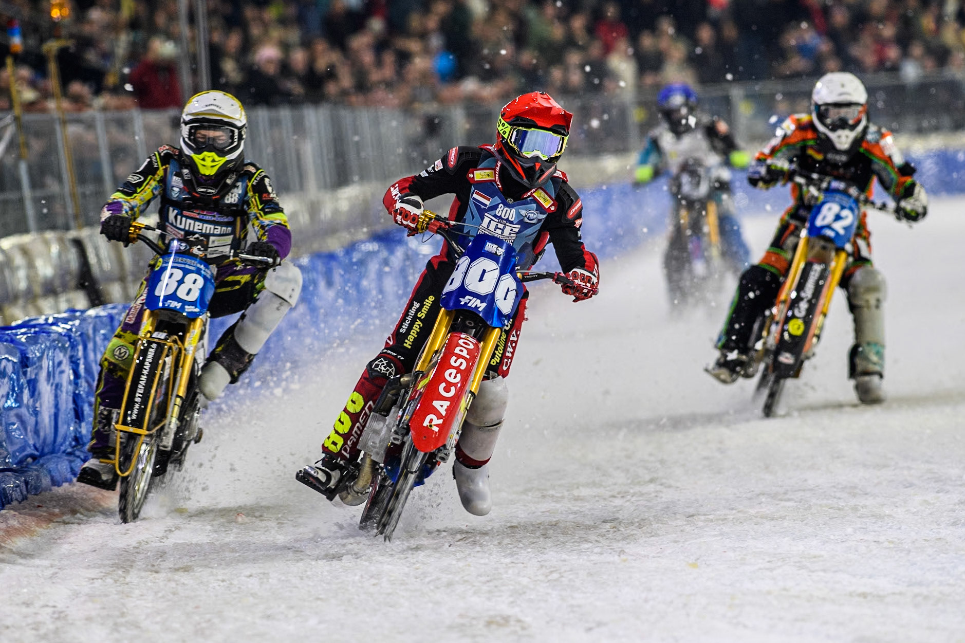 Netherlands' Jasper Iwema (800) in Red leading Germany's Max Niedermaier (88) in Yellow Germany's Markus Jell (82) in White and Reserve  Sweden's Filip Jäger (17) in Blue during the FIM Ice Speedway Gladiators World Championship Final 4 at Ice Rink Thialf, Heerenveen on Sunday 7th April 2024. (Photo: Ian Charles | MI News)