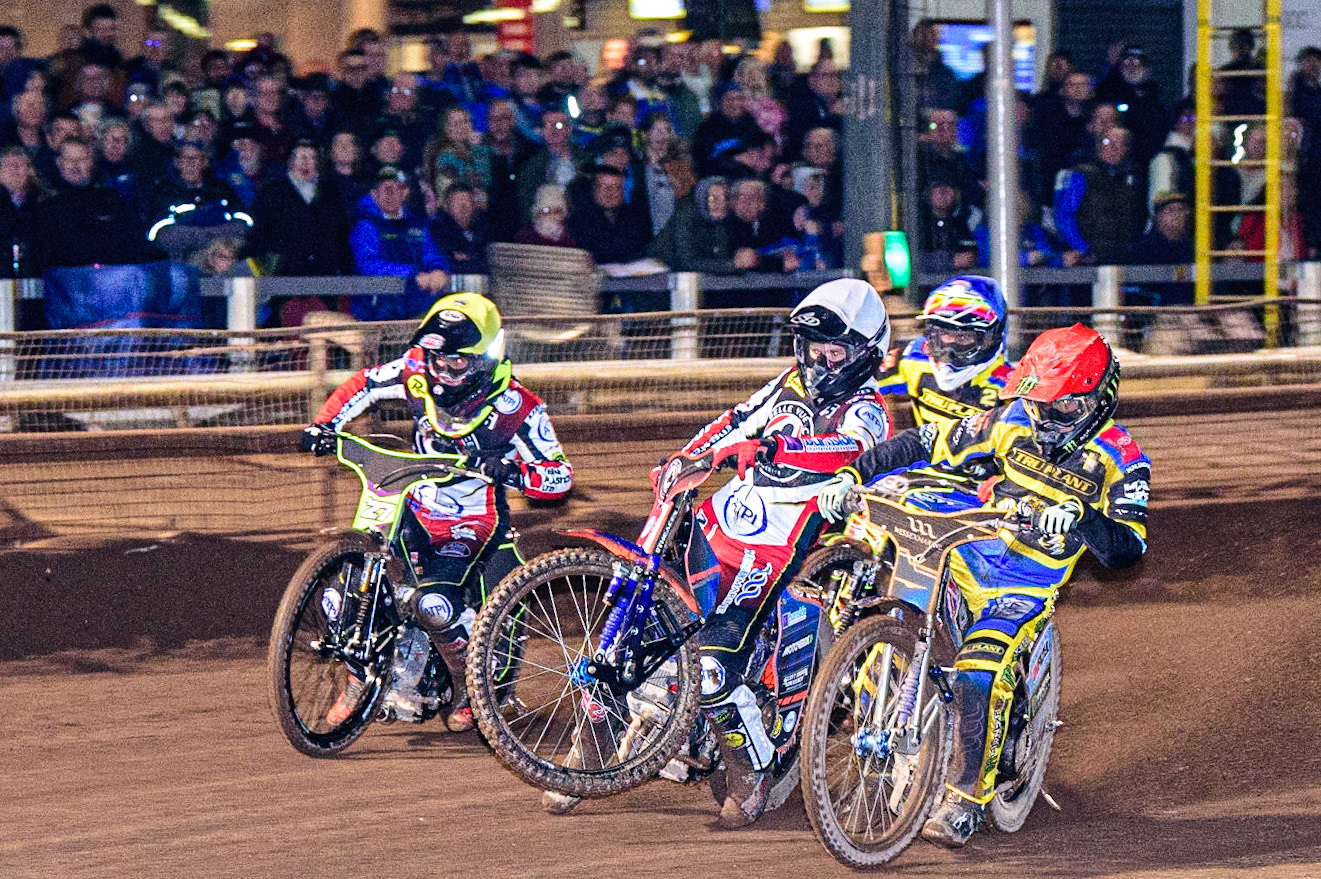 Brady Kurtz  (White) picks up some drive alongside Jack Holder  (Red), Tom Brennan  (Yellow) with David Bellego  (Blue) behind during the Sheffield Tigers vs Belle Vue Aces meeting in the SGP Premiership at Owlerton Stadium, Sheffield on Thursday 23rd March 2023. (Photo: Ian Charles | MI News)