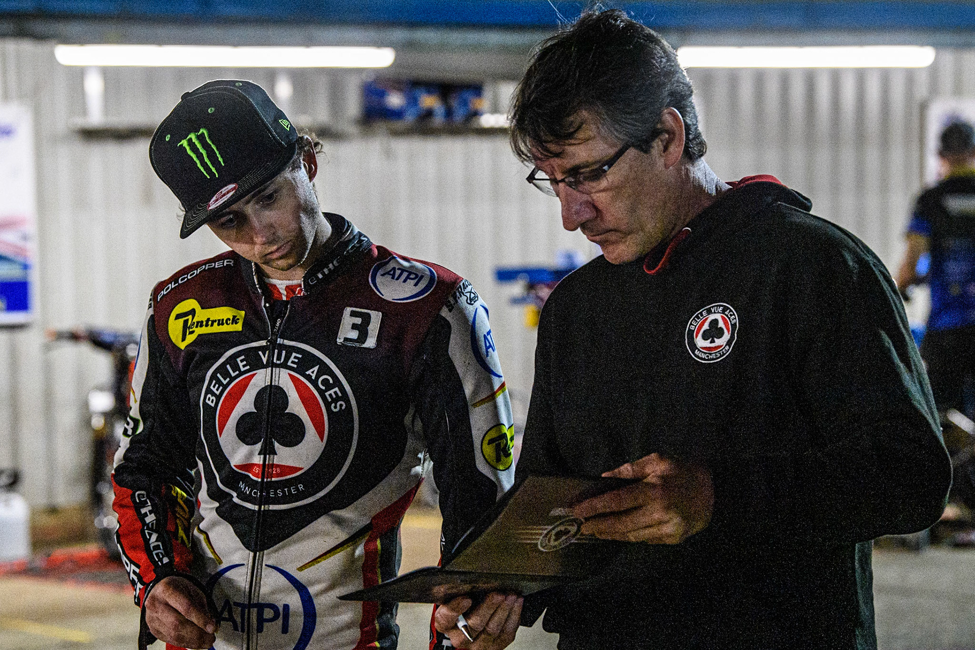 Jaimon Lidsey (Left) with Aces’ Team Manager Mark Lemon  as they discuss tactics during the Sports Insure Premiership match between King's Lynn Stars and Belle Vue Aces at the Adrian Flux Arena, King's Lynn on Thursday 24th August 2023. (Photo: Ian Charles | MI News)