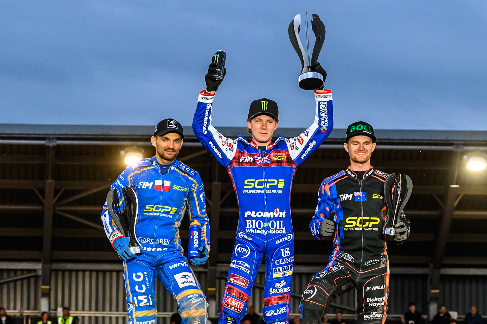 Top3: (L to R) Bartosz Zmarzlik (2nd), Dan Bewley (Winner) Brady Kurtz (3rd) during the ATPI FIM Speedway Grand Prix Round 4 at the National Speedway Stadium, Manchester, on Friday 13th June 2025. (Photo: Ian Charles | MI News)