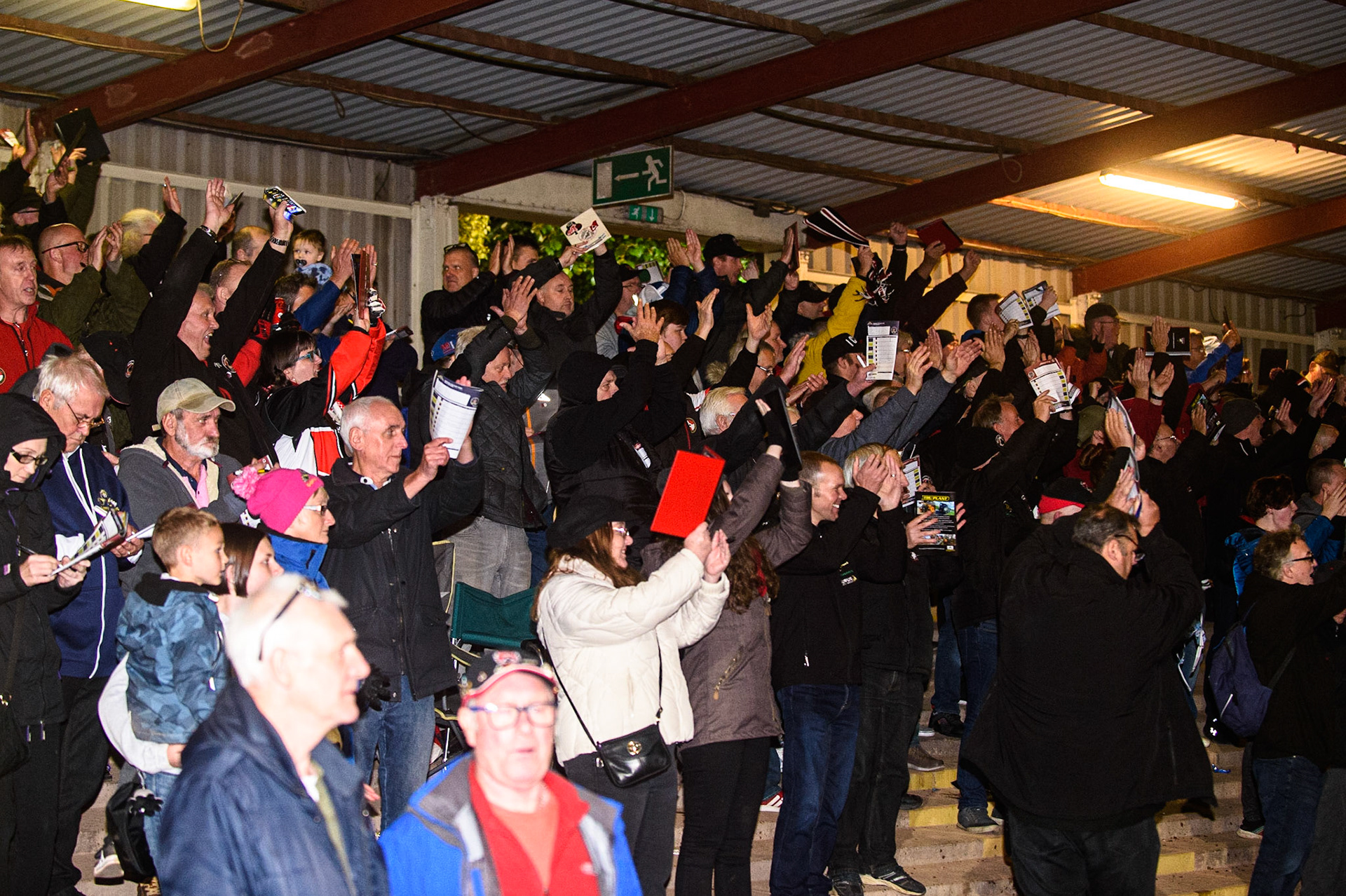 SHEFFIELD, UK. OCT 4THBelle Vue Fans cheer their riders home during the SGB Premiership Semi Final Playoff 1st Leg between Sheffield Tigers and Belle Vue Aces at Owlerton Stadium, Sheffield on Monday 4th October 2021. (Credit: Ian Charles | MI News)