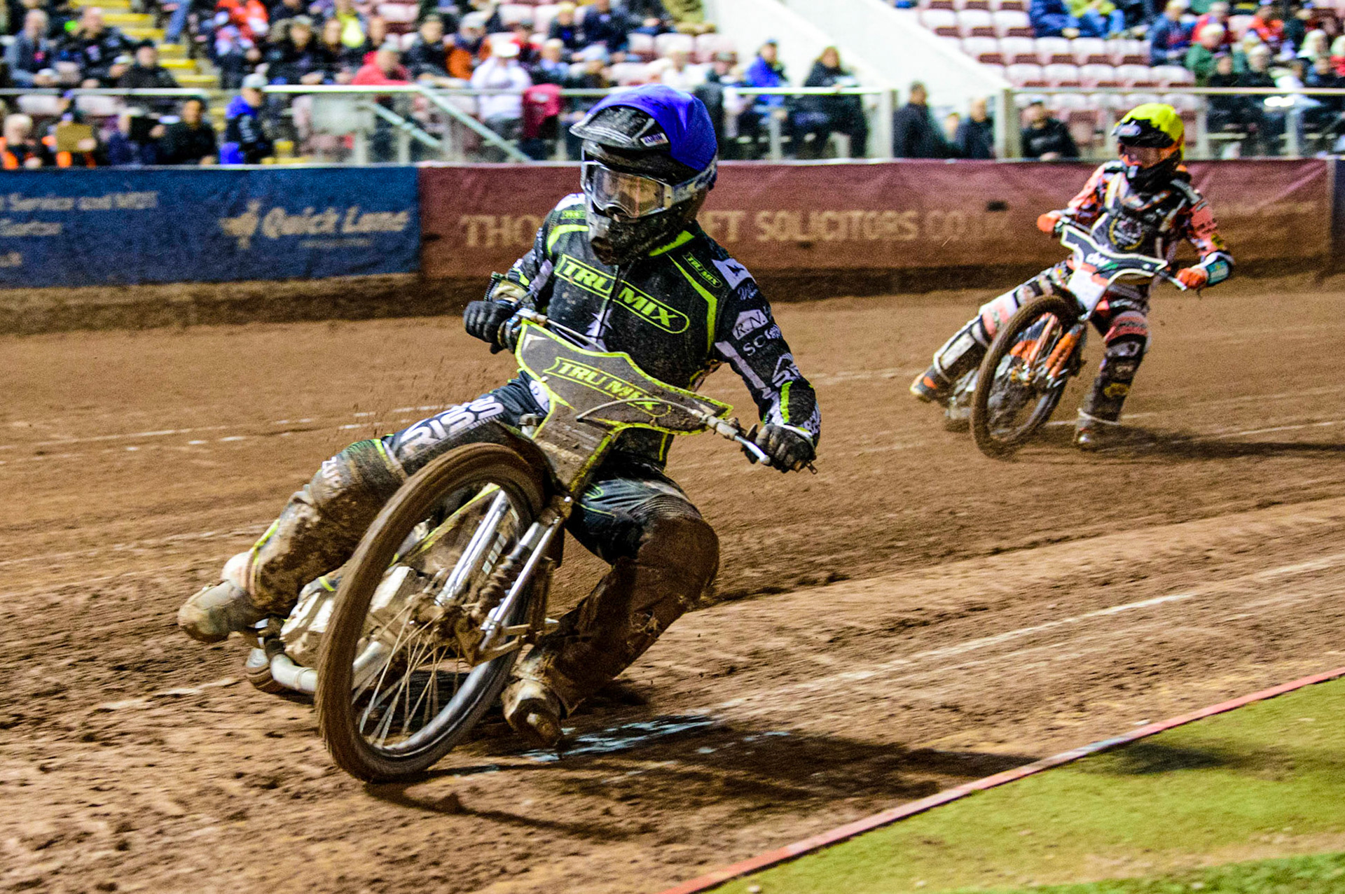 Erik Riss (Blue) leads Jordan Jenkins (Yellow)  during the Grant Henderson Pairs at the National Speedway Stadium, Manchester on Thursday 27th October 2022. (Credit: Ian Charles | MI NEWS)
