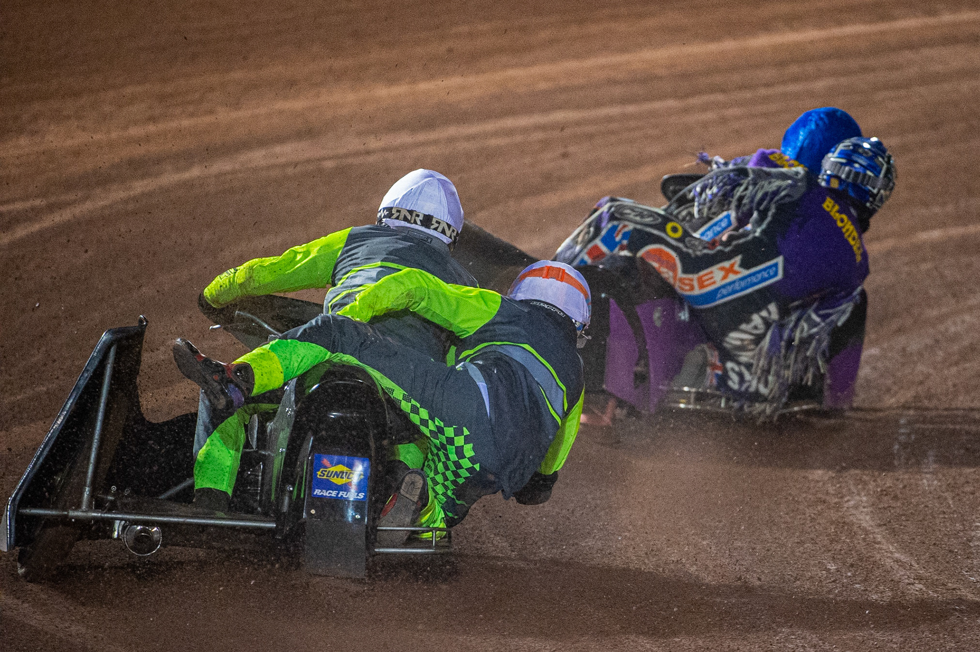 MANCHESTER, ENGLAND Philip Wynn & Adam Cowper Smith(11) (White) chases Clint Blondel & Richard Webb(10) during the  ACU Sidecar Speedway Manchester Masters,  Belle Vue National Speedway Stadium, Manchester Saturday 12 October 2019 (Credit: Ian Charles | MI News)