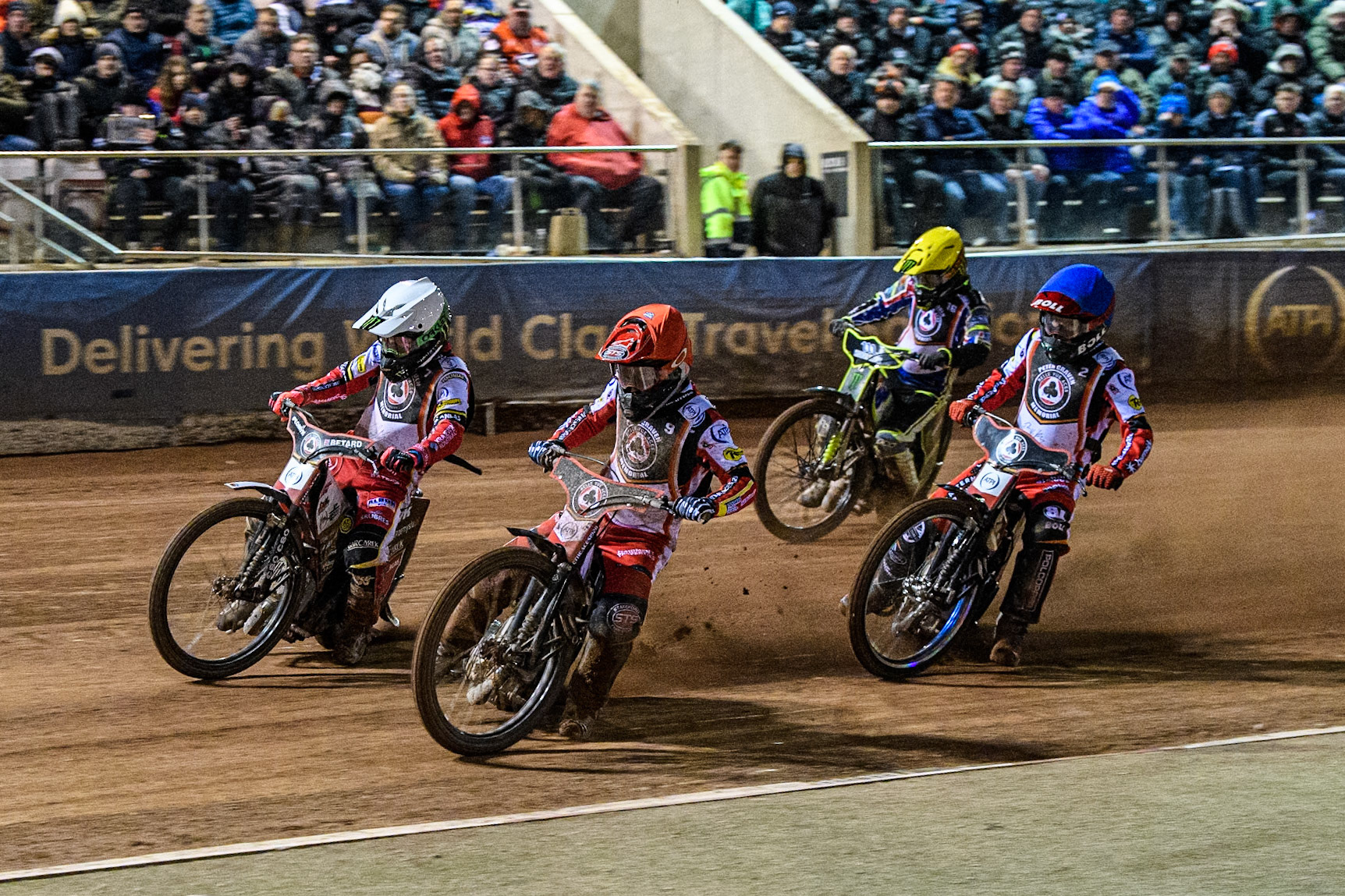Zach Cook in Red rides inside Dan Bewley in White with Brady Kurtz in Blue and Chris Holder in Yellow behind during the Peter Craven Memorial Trophy at the National Speedway Stadium, Manchester on Monday 17th March 2025. (Photo: Ian Charles | MI News)