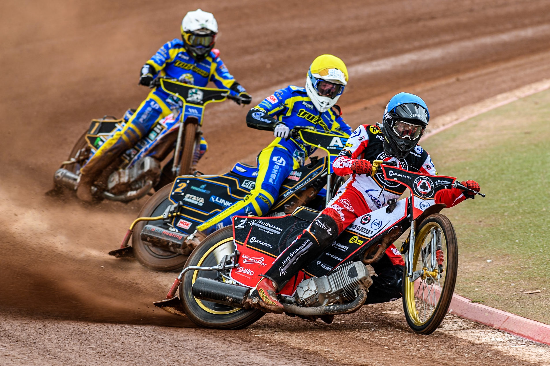 Norick Blödorn of Belle Vue Aces in Blue leading Anders Rowe of Sheffield Tigers in Yellow and Jack Holder of Sheffield Tigers in White during the Rowe Motor Oil Premiership match between Belle Vue Aces and Sheffield Tigers at the National Speedway Stadium, Manchester on Monday 5th May 2025. (Photo: Ian Charles | MI News)