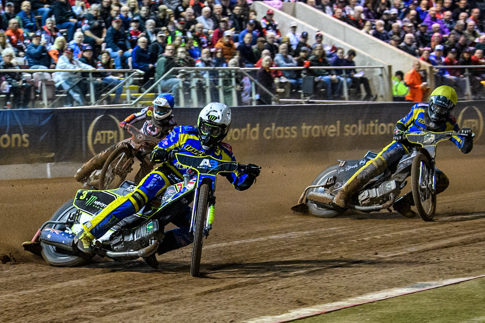 Sheffield Tigers' Chris Holder  in White leading Sheffield Tigers' Josh Pickering  in Yellow and Belle Vue Aces' Ben Cook  in Blue during the Rowe Motor Oil Premiership Play Off Semi Final 2, 1st Leg match between Belle Vue Aces and Sheffield Tigers at the National Speedway Stadium, Manchester on Monday 16th September 2024. (Photo: Ian Charles | MI News)