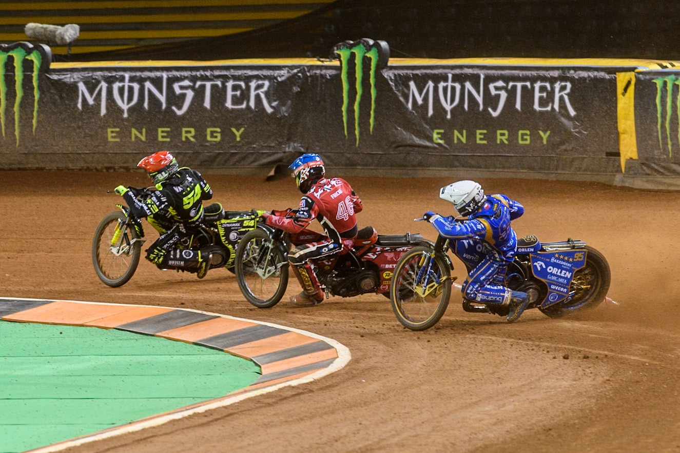Bartosz Zmarzlik (95) of Poland  in White chases Max Fricke (46) of Australia in Blue and Martin Vaculik (54) of Slovakia in Red during the FIM Speedway Grand Prix of Great Britain at The Principality Stadium, Cardiff on Saturday 17th August 2024. (Photo: Ian Charles | MI News)