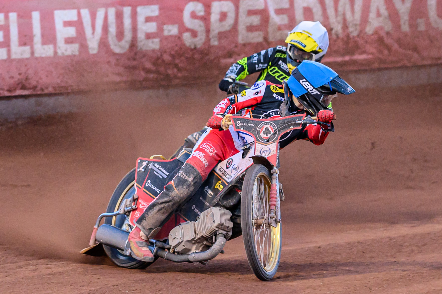 Norick Blödorn of Belle Vue Aces in Blue leading Adam Ellis of Ipswich Witches  in White during the Rowe Motor Oil Premiership match between Belle Vue Aces and Ipswich Witches at the National Speedway Stadium, Manchester on Monday 4th August 2025. (Photo: Ian Charles | MI News)