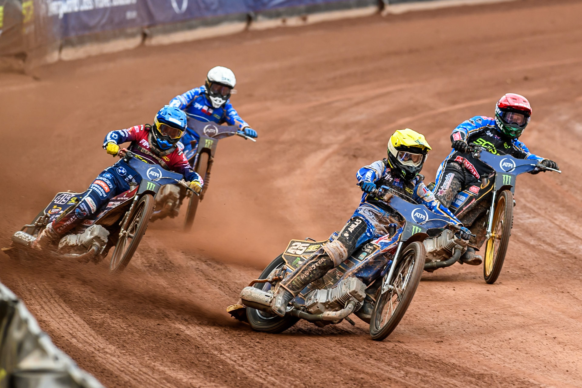 Jack Holder (25) of Australia in Yellow leading Jason Doyle (69) of Australia in Red, Dominik Kubera (415) of Poland in Blue and Bartosz Zmarzlik (95) of Poland in White during the ATPI FIM Speedway Grand Prix Round 4 at the National Speedway Stadium, Manchester, on Friday 13th June 2025. (Photo: Ian Charles | MI News)