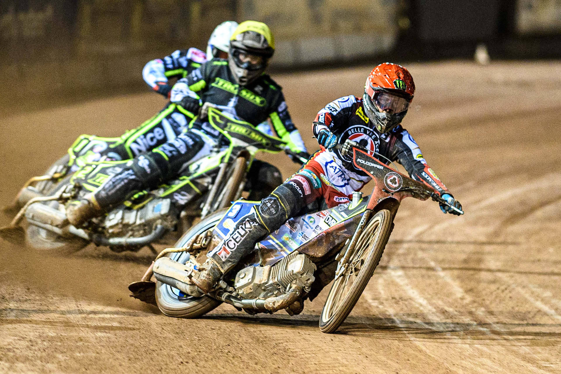 Jaimon Lidsey  (Red) leads  Erik Riss (Yellow) and Emil Sayfutdinov  (White) during the Sports Insure Premiership Semi Final Playoff 2nd leg match between Belle Vue Aces and Ipswich Witches at the National Speedway Stadium, Manchester on Monday 25th September 2023. (Photo: Ian Charles | MI News)