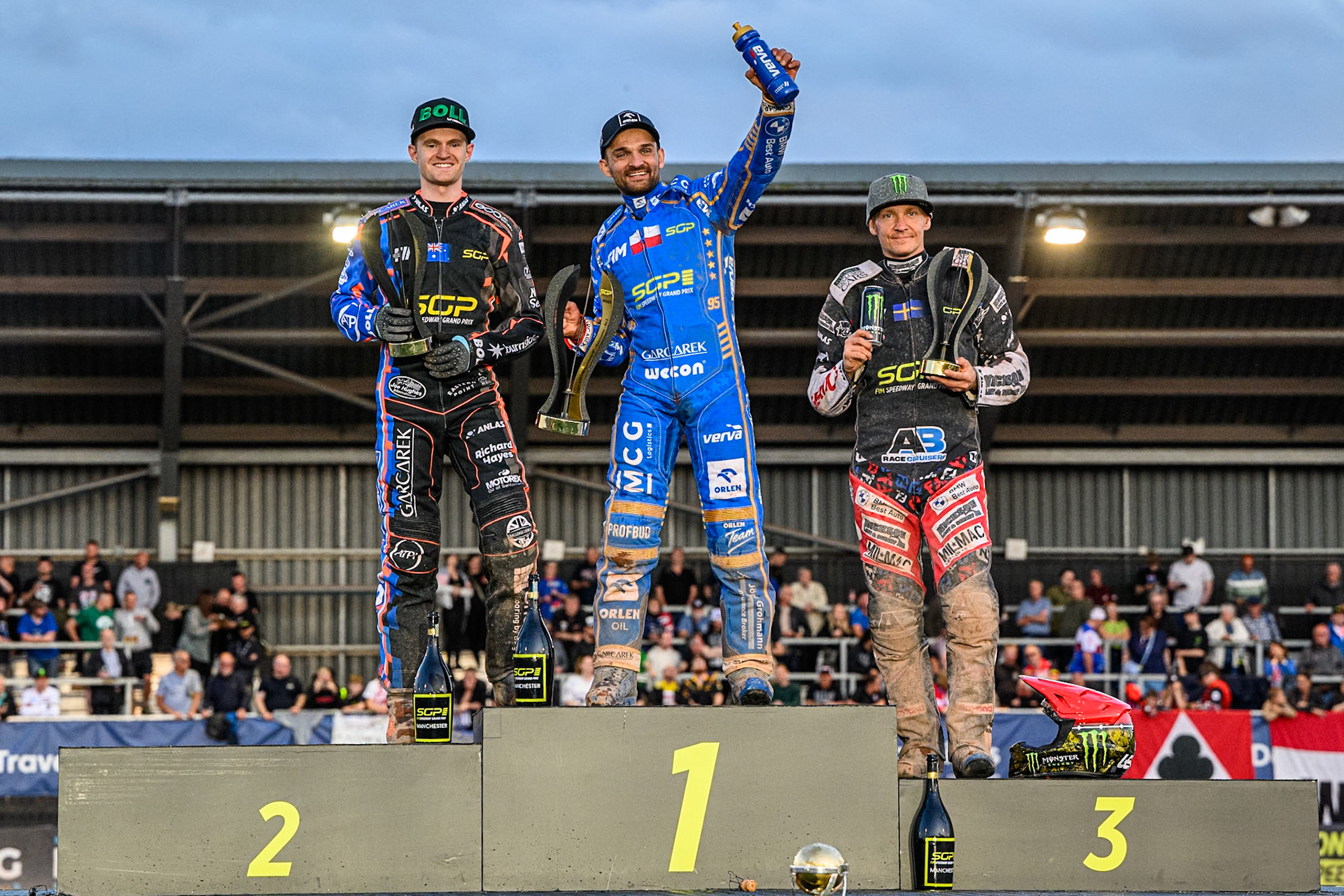 Top3: (L to R) Brady Kurtz (2nd), Bartosz Zmarzlik (First), Fredrik Lindgren (3rd) during the ATPI FIM Speedway Grand Prix Round 5 at the National Speedway Stadium, Manchester, on Saturday 14th June 2025. (Photo: Ian Charles | MI News)