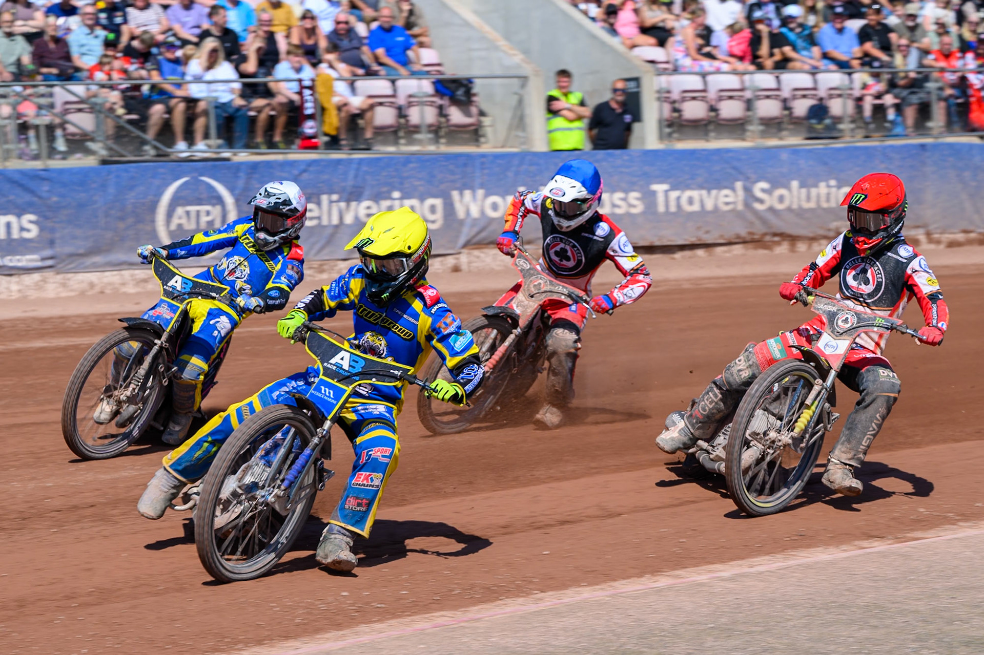 Jack Holder of Sheffield Tigers  in Yellow and Josh Pickering of Sheffield Tigers  in White leading Jaimon Lidsey of Belle Vue Aces  in Red and Jake Mulford of Belle Vue Aces  in Blue during the Rowe Motor Oil Premiership match between Belle Vue Aces and Sheffield Tigers at the National Speedway Stadium, Manchester on Monday 25th August 2025. (Photo: Ian Charles | MI News)