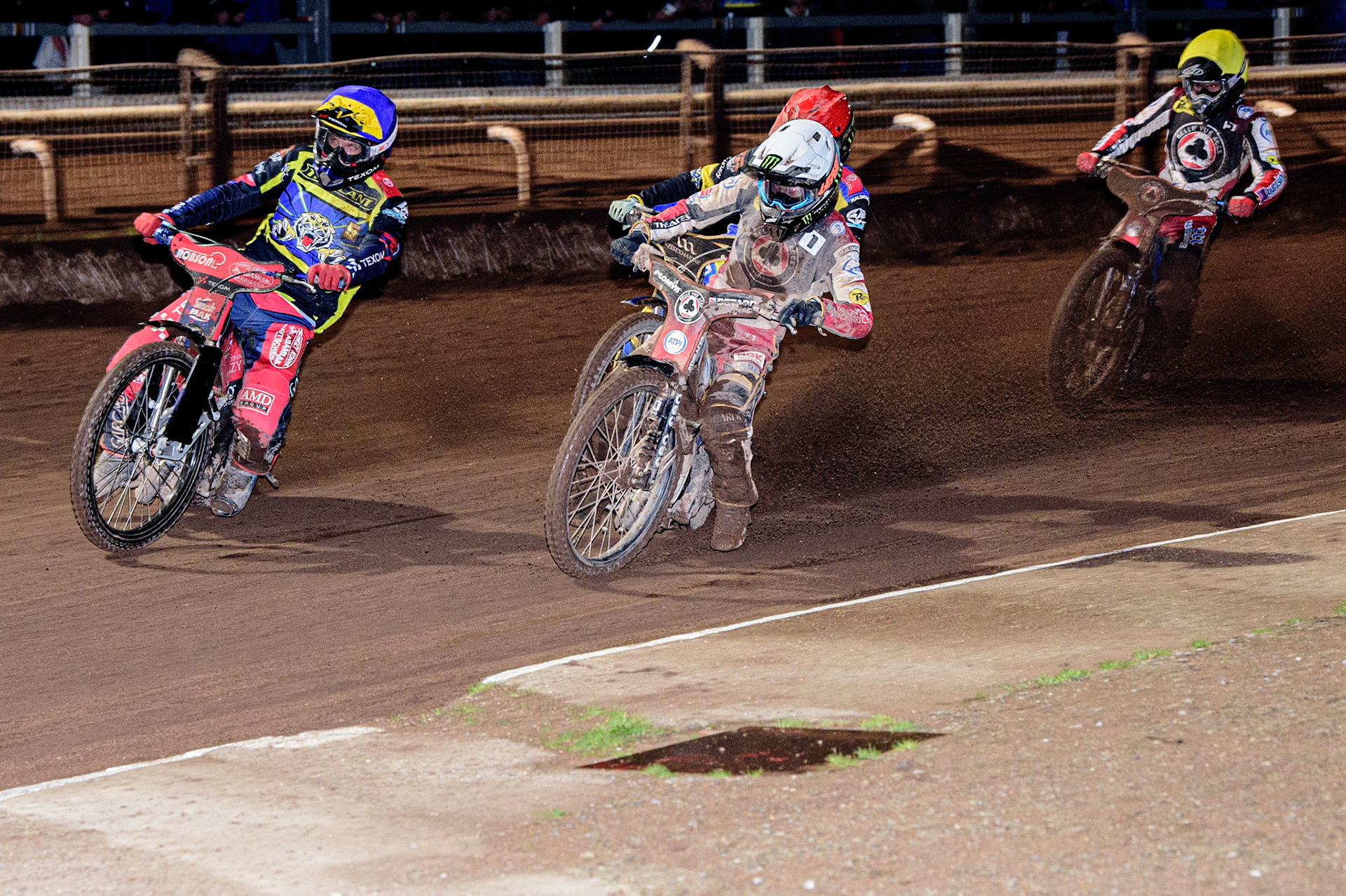 Tobiasz Musielak  (Blue) leads Dan Bewley  (White), Jack Holder  (Red) and Brady Kurtz  (Yellow) during the Sheffield Tigers vs Belle Vue Aces meeting in the SGP Premiership at Owlerton Stadium, Sheffield on Thursday 23rd March 2023. (Photo: Ian Charles | MI News)