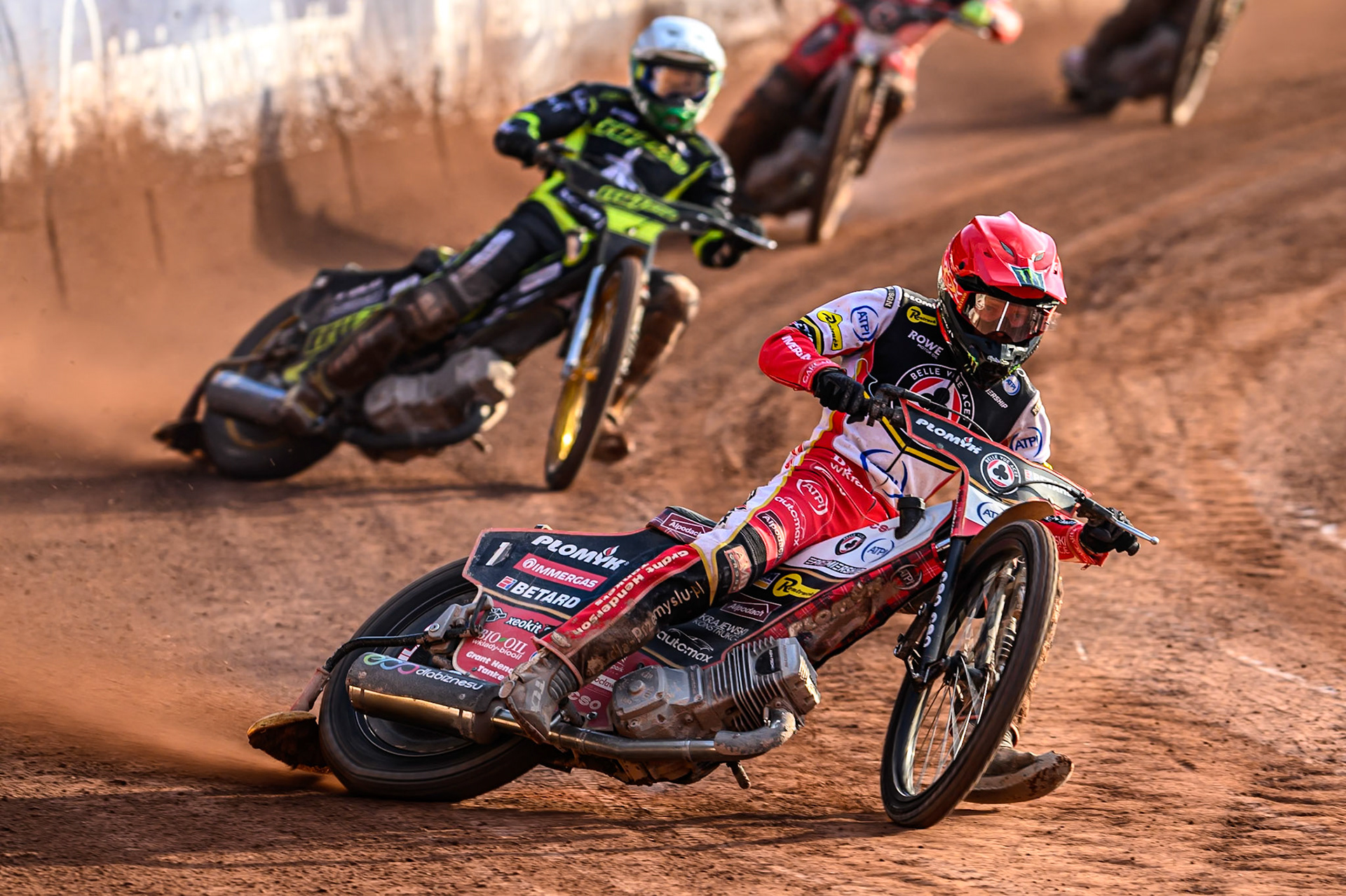 Belle Vue Aces' Dan Bewley  in Red leading Ipswich Witches' Jason Doyle  in White during the Rowe Motor Oil Premiership match between Belle Vue Aces and Ipswich Witches at the National Speedway Stadium, Manchester on Monday 30th June 2025. (Photo: Ian Charles | MI News)